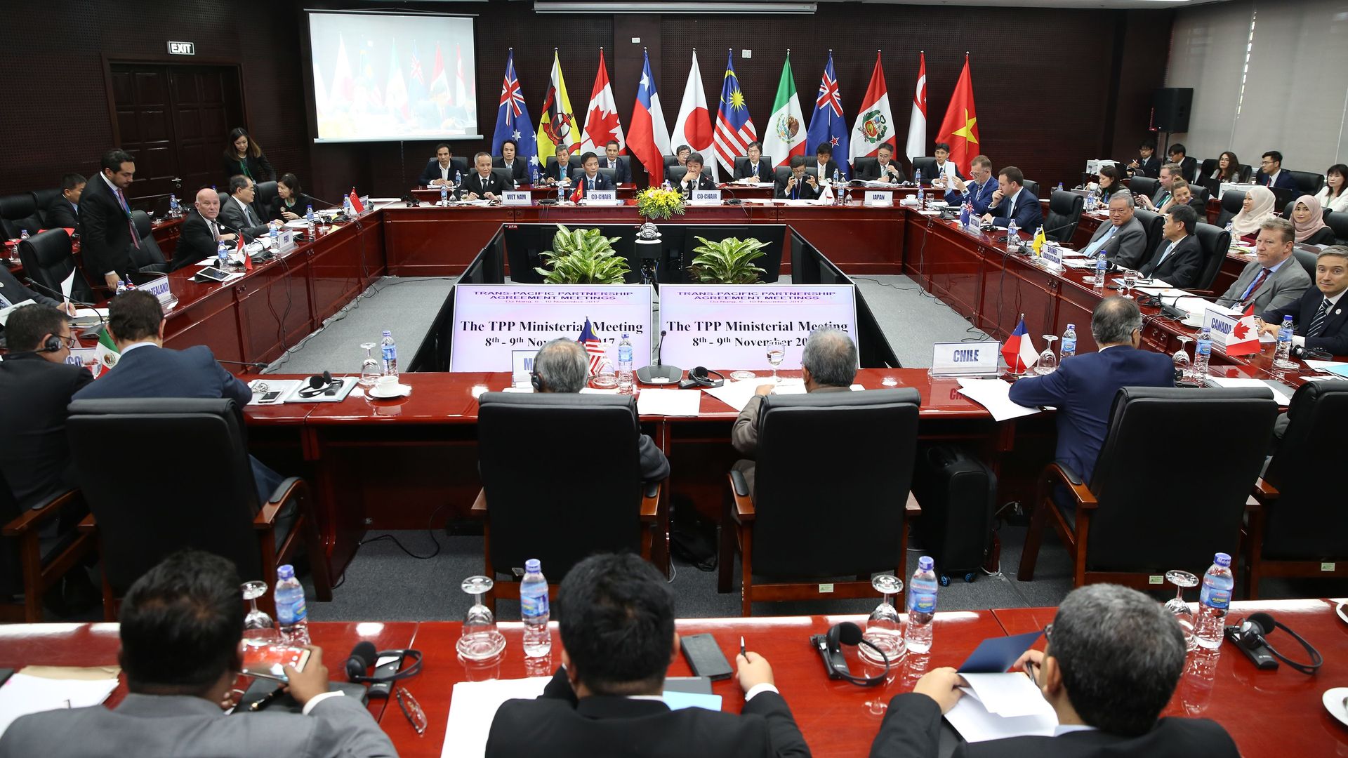 Asian trade delegates around a conference table