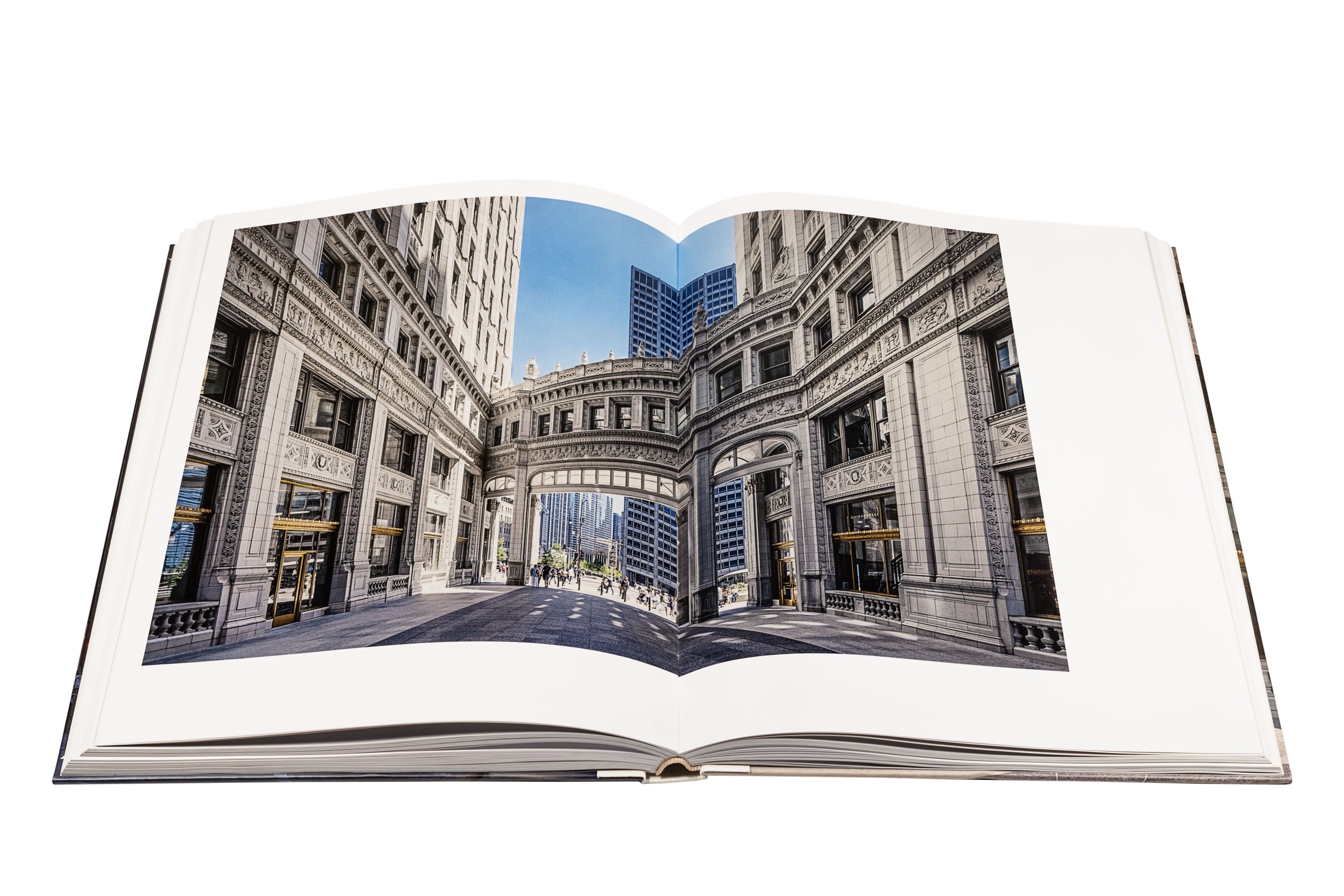 Photo of a book opened to a page that shows the exterior of a building