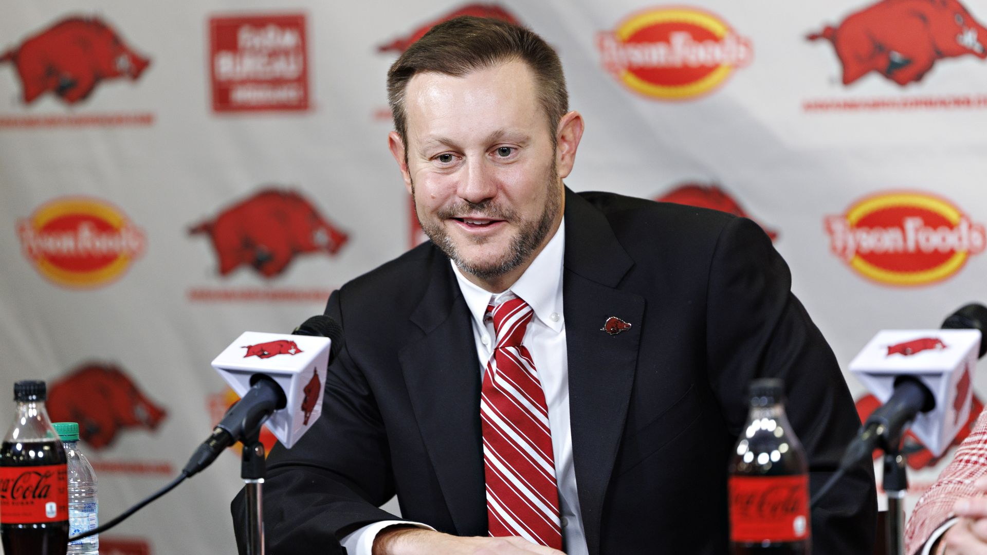 : New Arkansas Razorback football Head Coach Ryan Silverfield answers question from reporters at his introduction press conference in the Broyles Center Media Room at Donald W. Reynolds Razorback Stadium on December 04, 2025