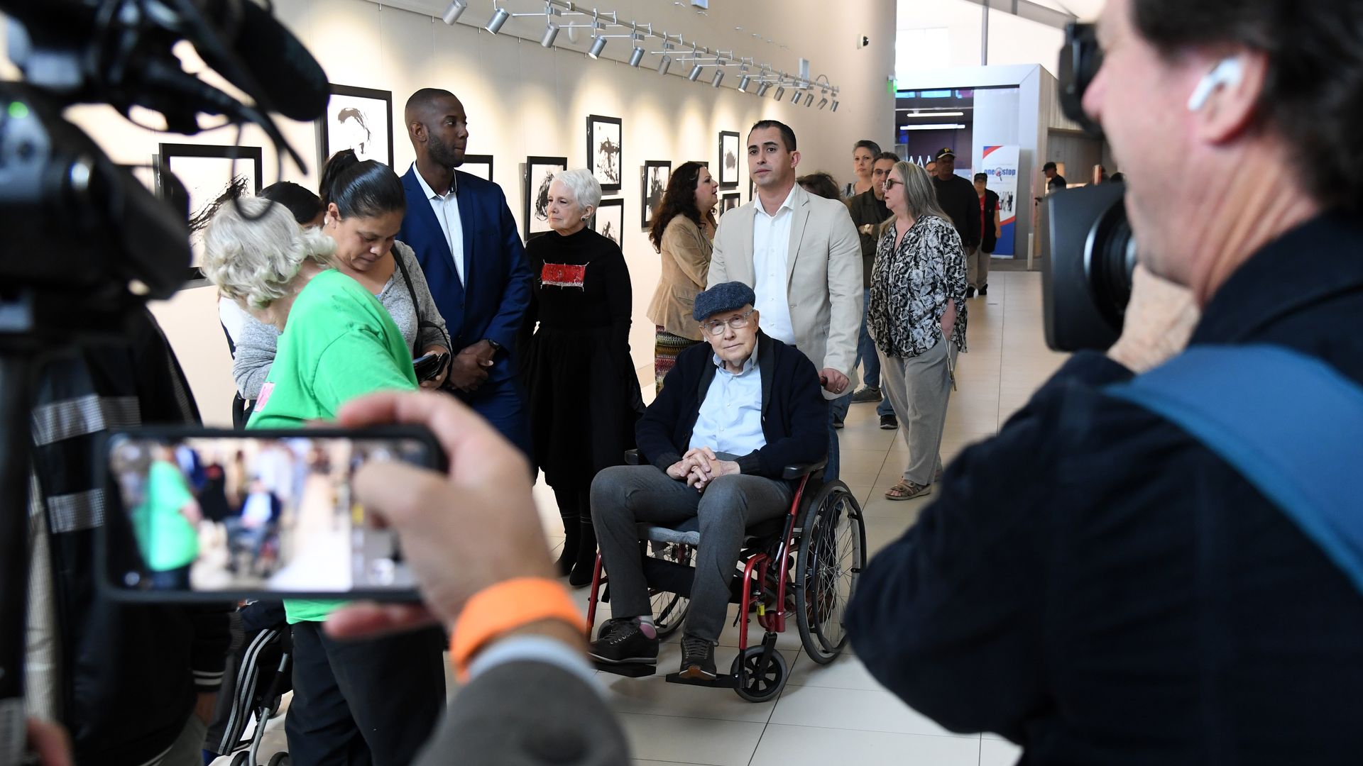 Former Sen. Harry Reid (D) waits on line to cast an early vote in the Nevada caucuses. 