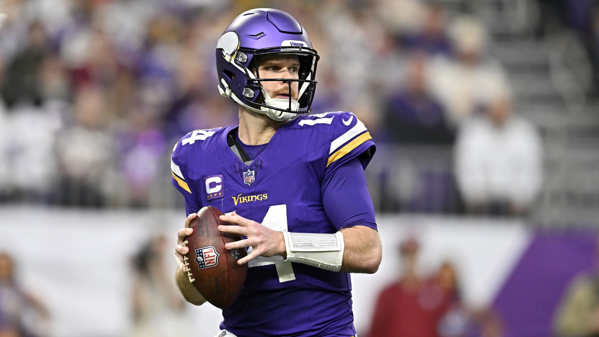 A photo of Sam Darnold holding a football 