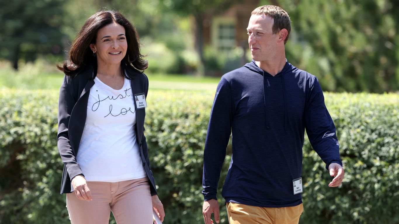 Sheryl Sandberg and Mark Zuckerberg walk together on Thursday at the Allen & Co. Sun Valley Conference in Idaho. Photo: Kevin Dietsch/Getty Images