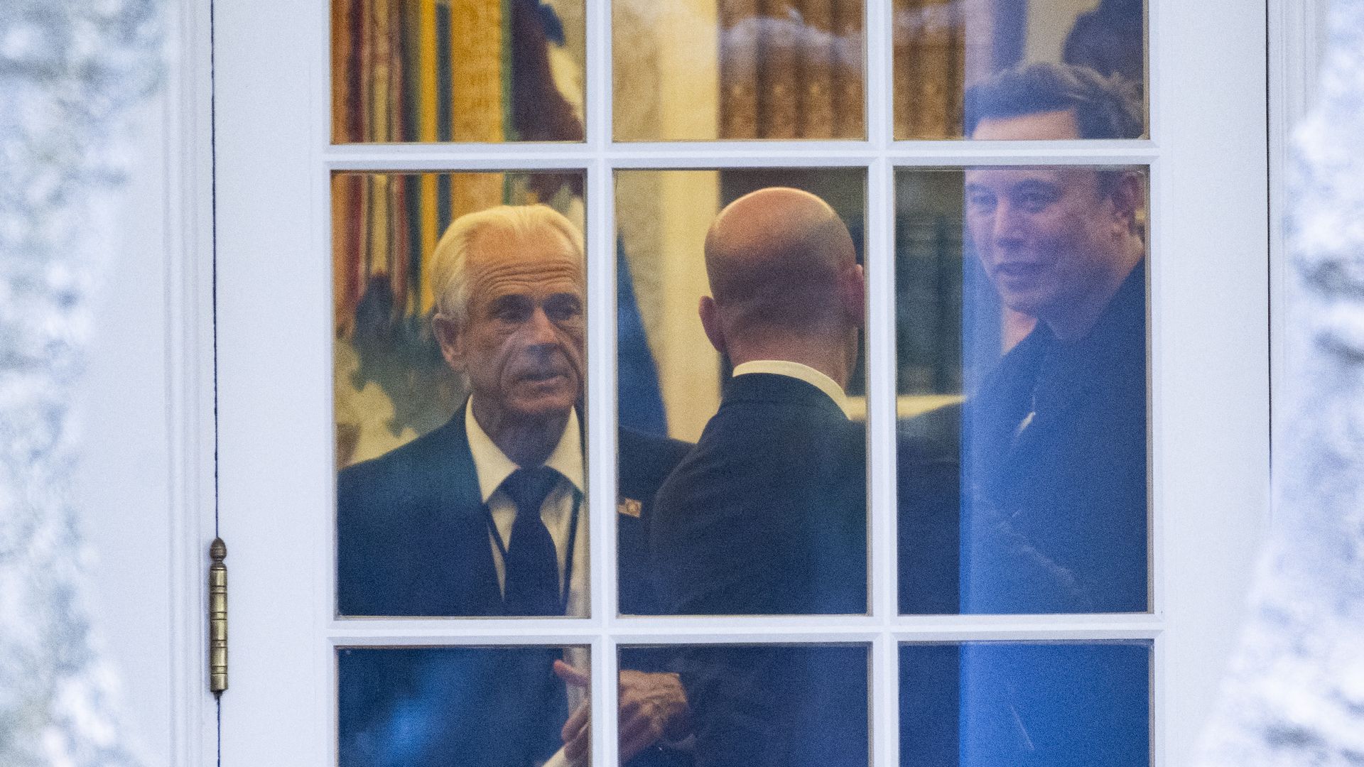 Elon Musk and Peter Navarro in the Oval Office.