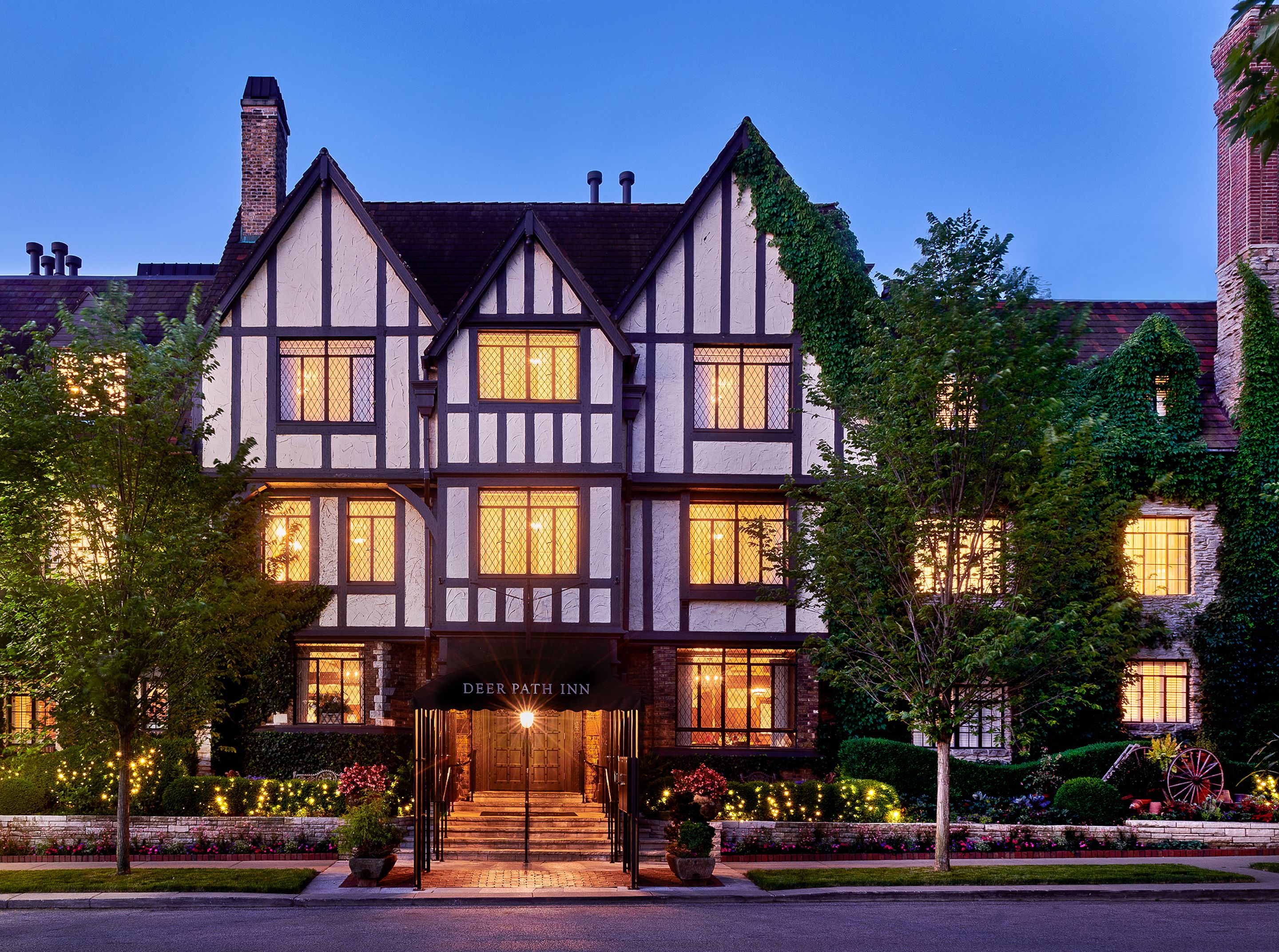 Brown and white tudor style hotel.