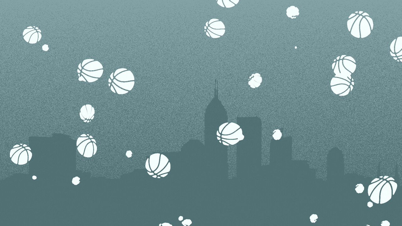 Animated illustration of a silhouette of the Indianapolis skyline with snowflakes in the shape of basketballs falling on it.