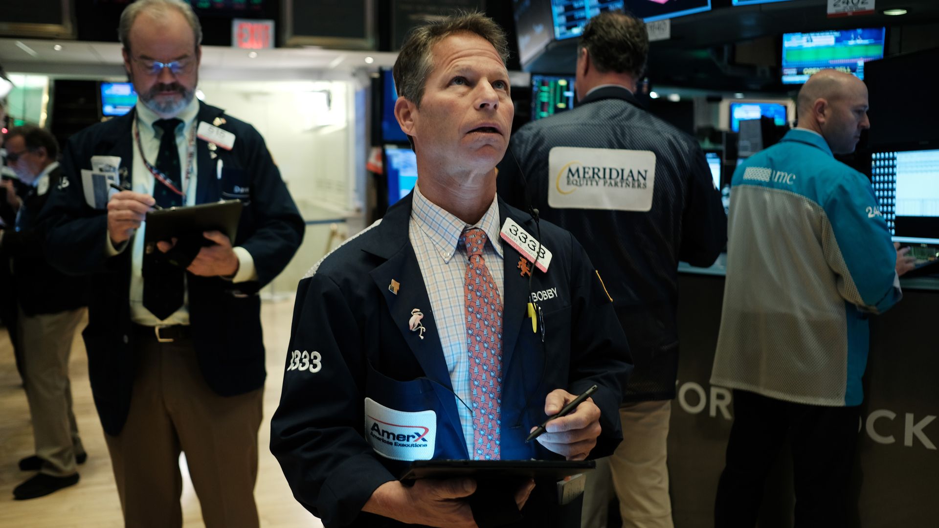 Traders work on the floor of the New York Stock Exchange (NYSE) on March 17, 2020 in New York City