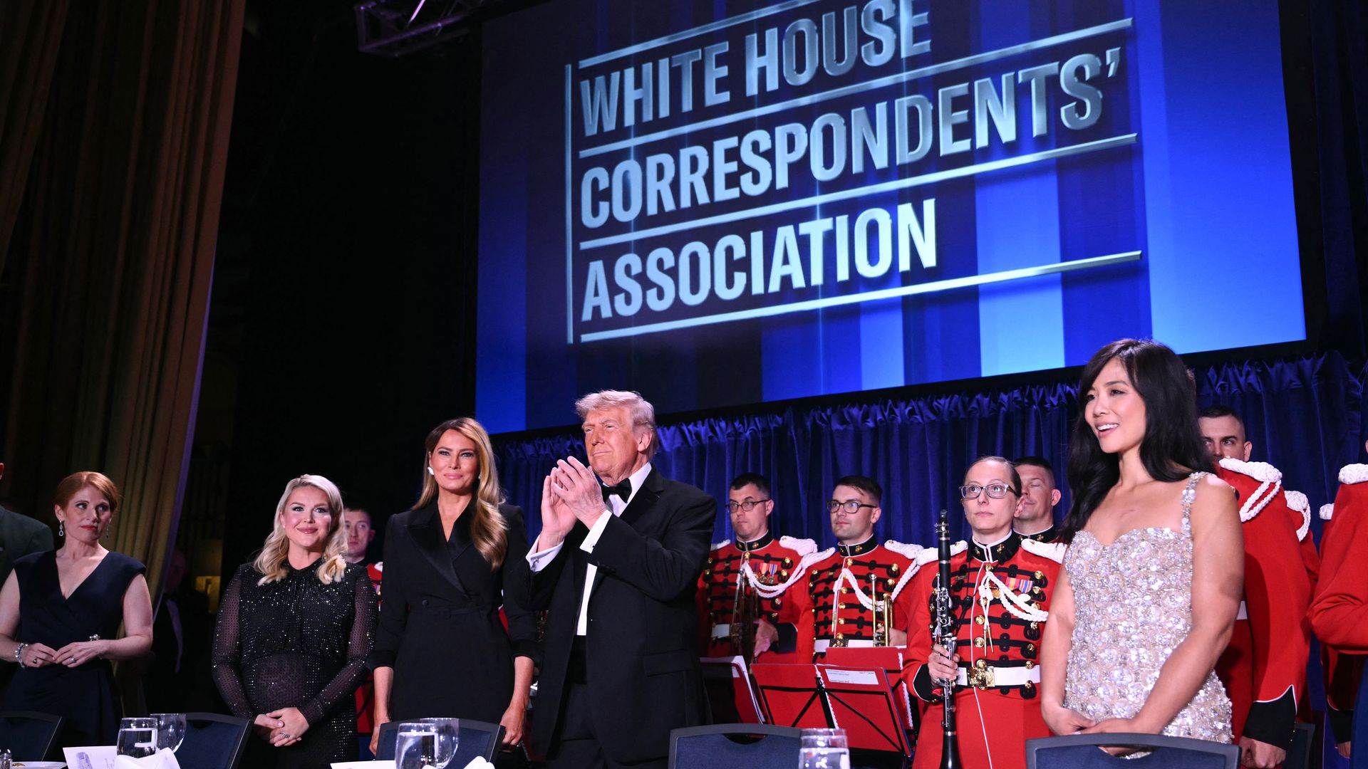 Journalist Karen Travers, White House Press Secretary Karoline Leavitt, US First Lady Melania Trump, US President Donald Trump and CBS News senior White House correspondent Weijia Jiang attend the White House Correspondents' dinner at the Washington Hilton in Washington, DC, on April 25, 2026. Presi