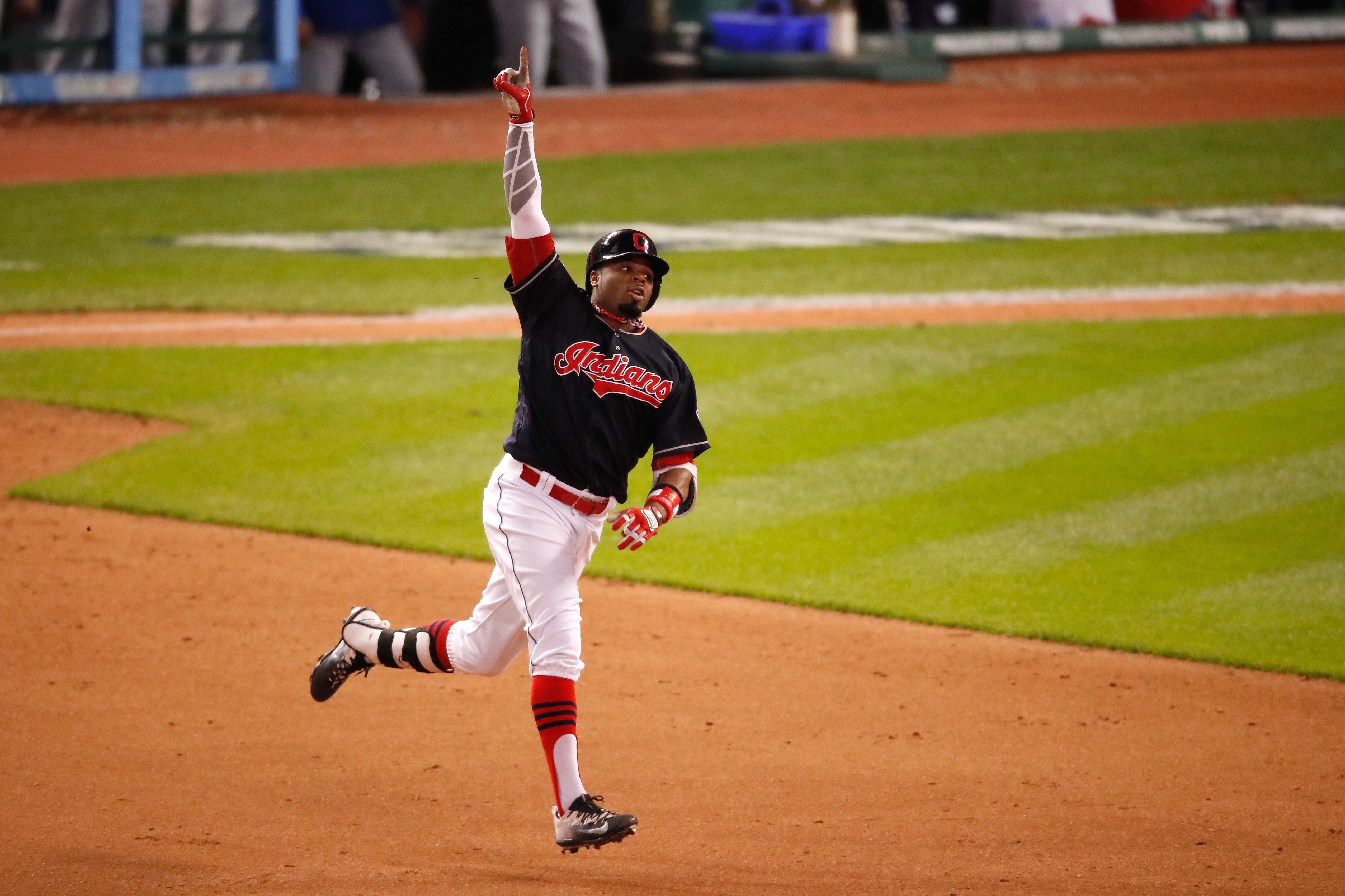 Cleveland Indians player Rajai Davis rounds the bases after a game tying home run in the 2016 World Series.