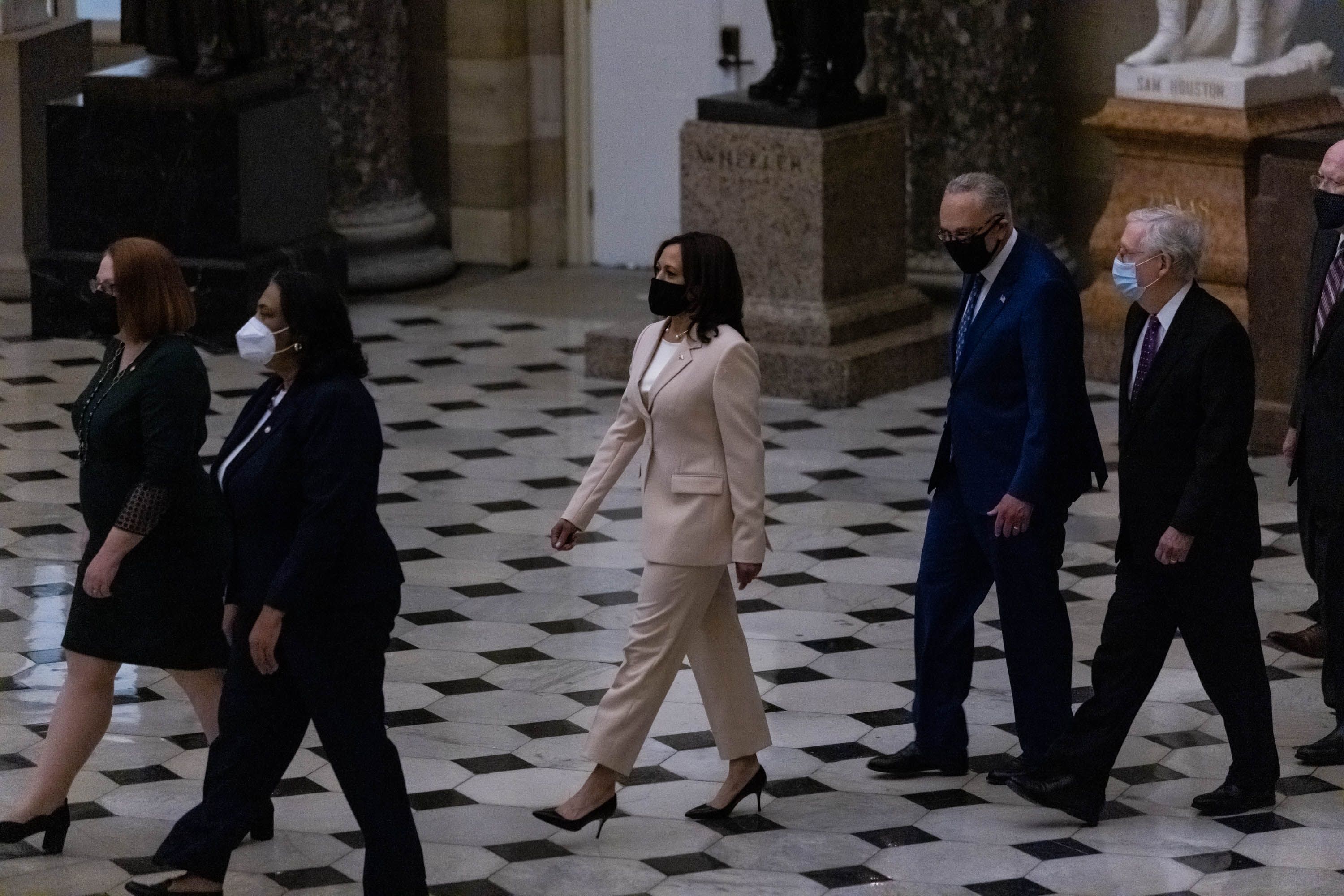 Vice President Kamala Harris leads Senate Majority Leader Chuck Schumer (D-NY) and Minority Leader Mitch McConnell (R-KY) walk through Statuary Hall in the U.S. Capitol April 28