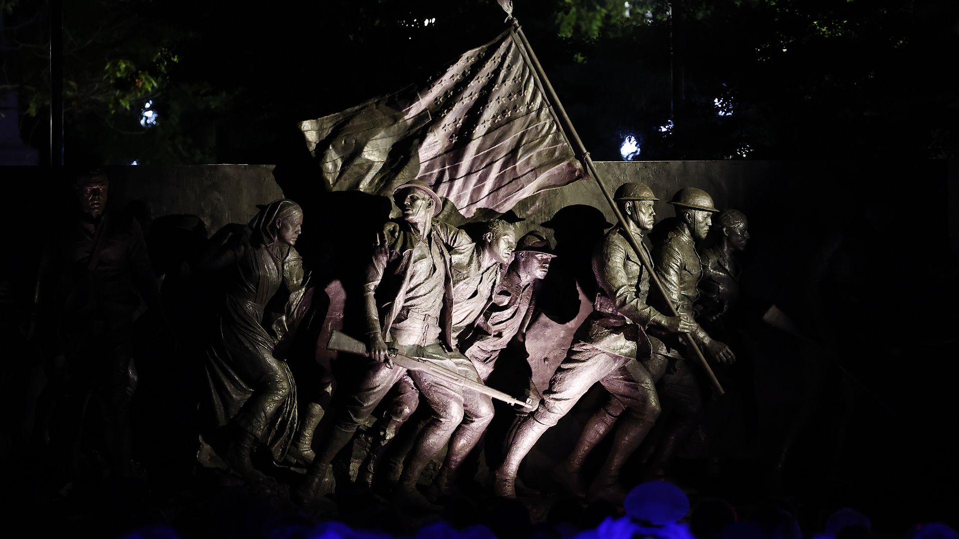 A view of the new "A Soldier's Journey" sculpture illuminated at night in D.C.