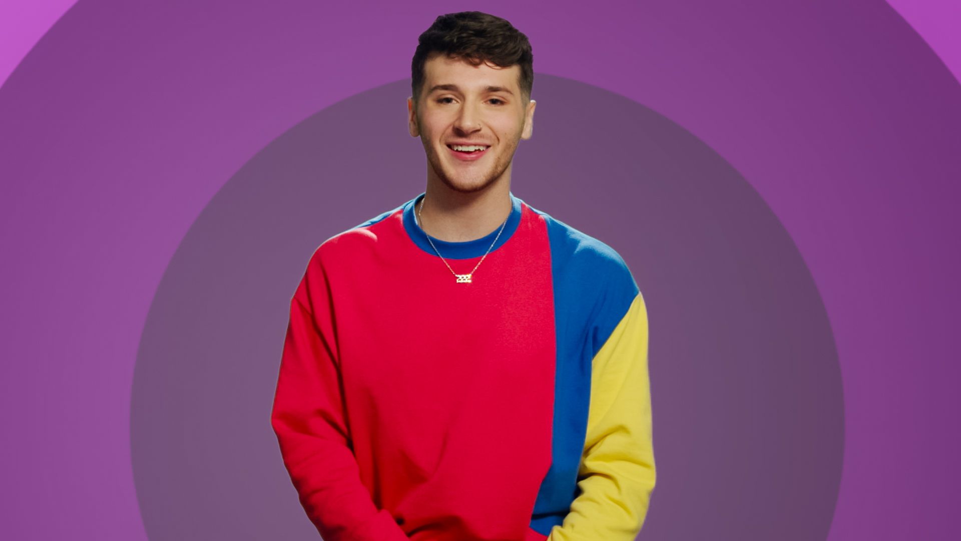 A photo of the contestant on a background background.