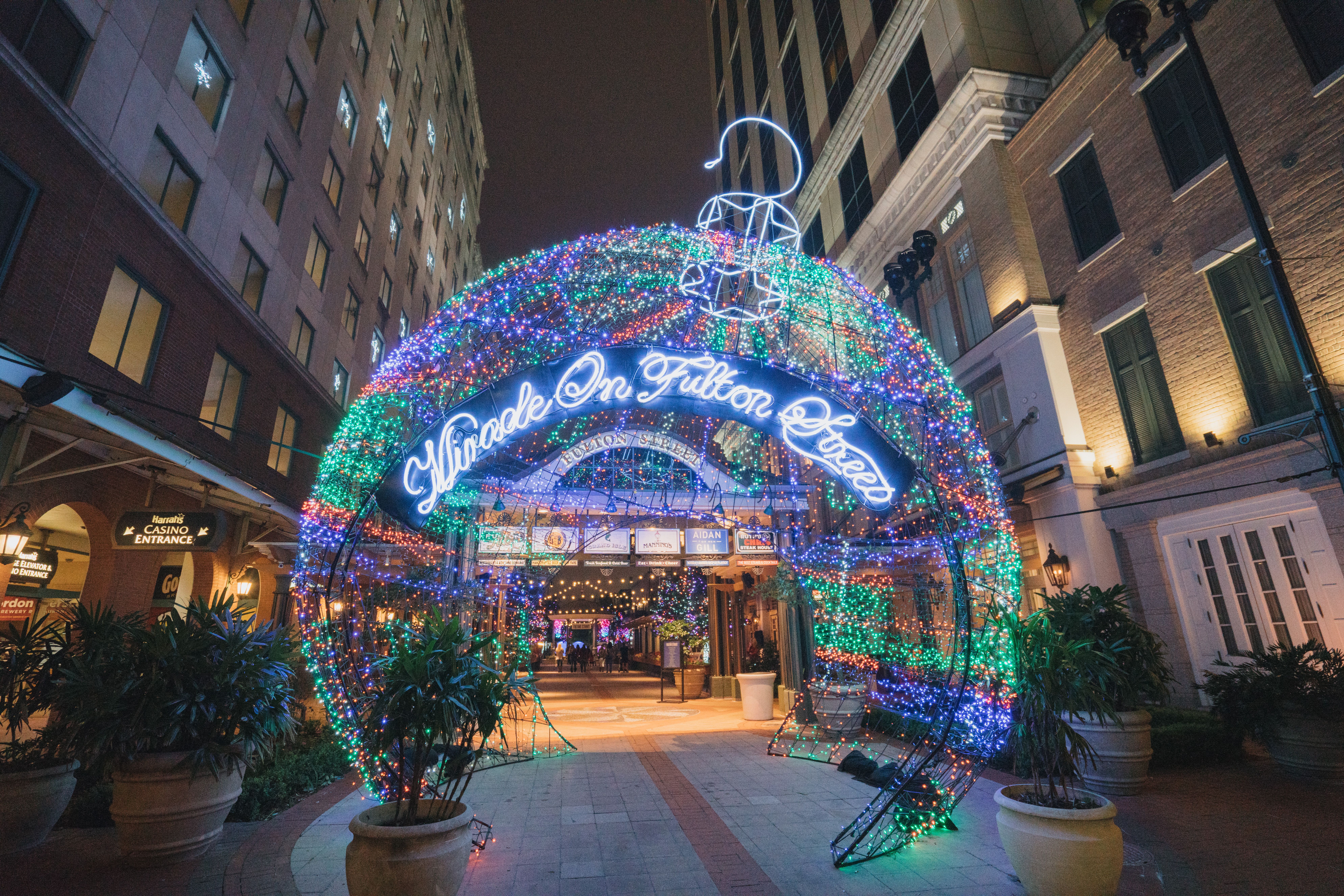 Photo shows a giant Christmas ornament with lights
