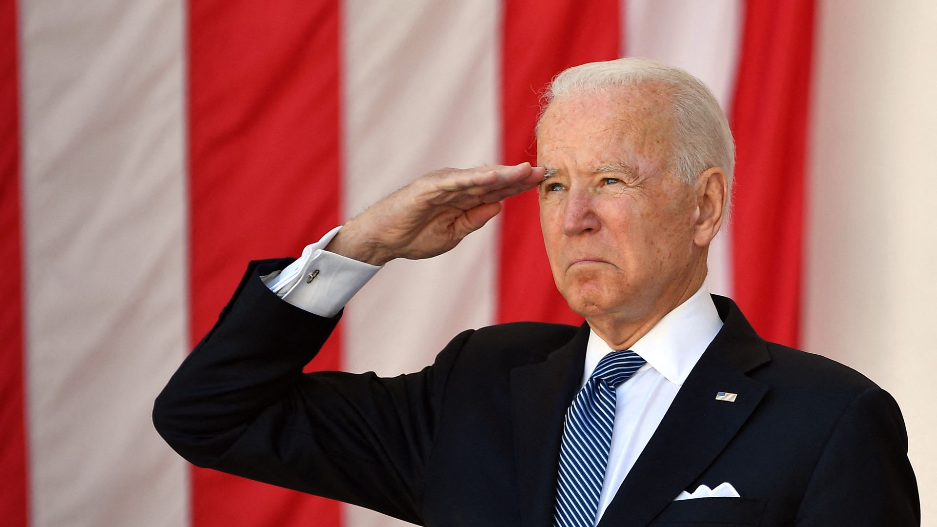 Biden saluting