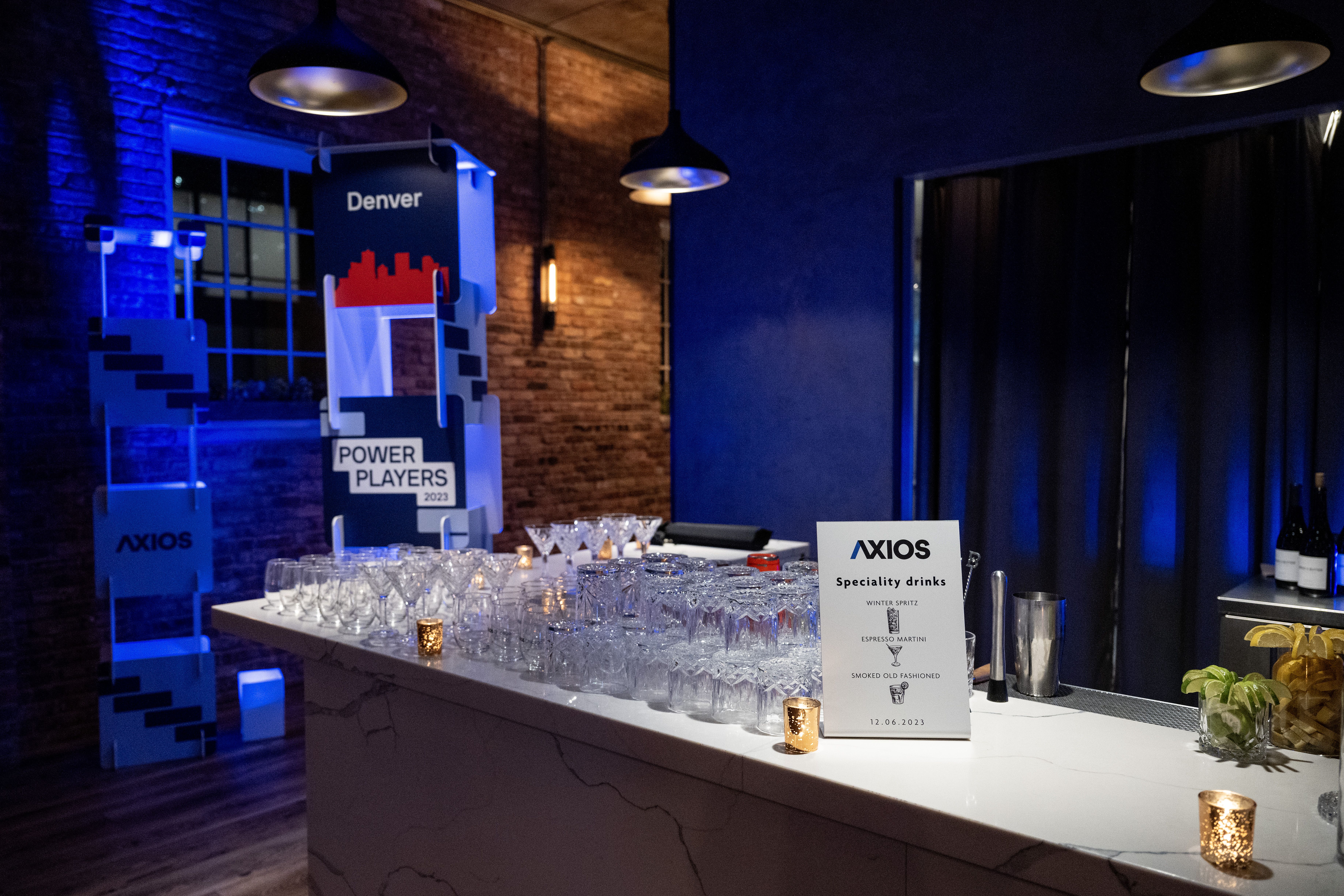 empty bar before an event with glassware 