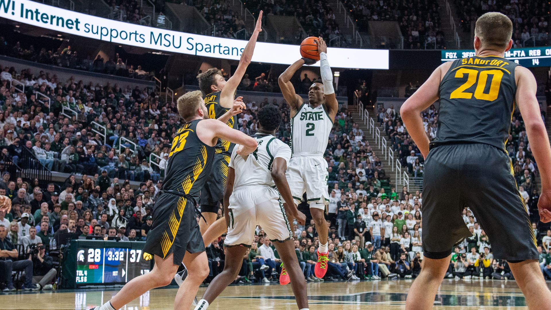 Michigan State's Tyson Walker shoots against Iowa in February. 