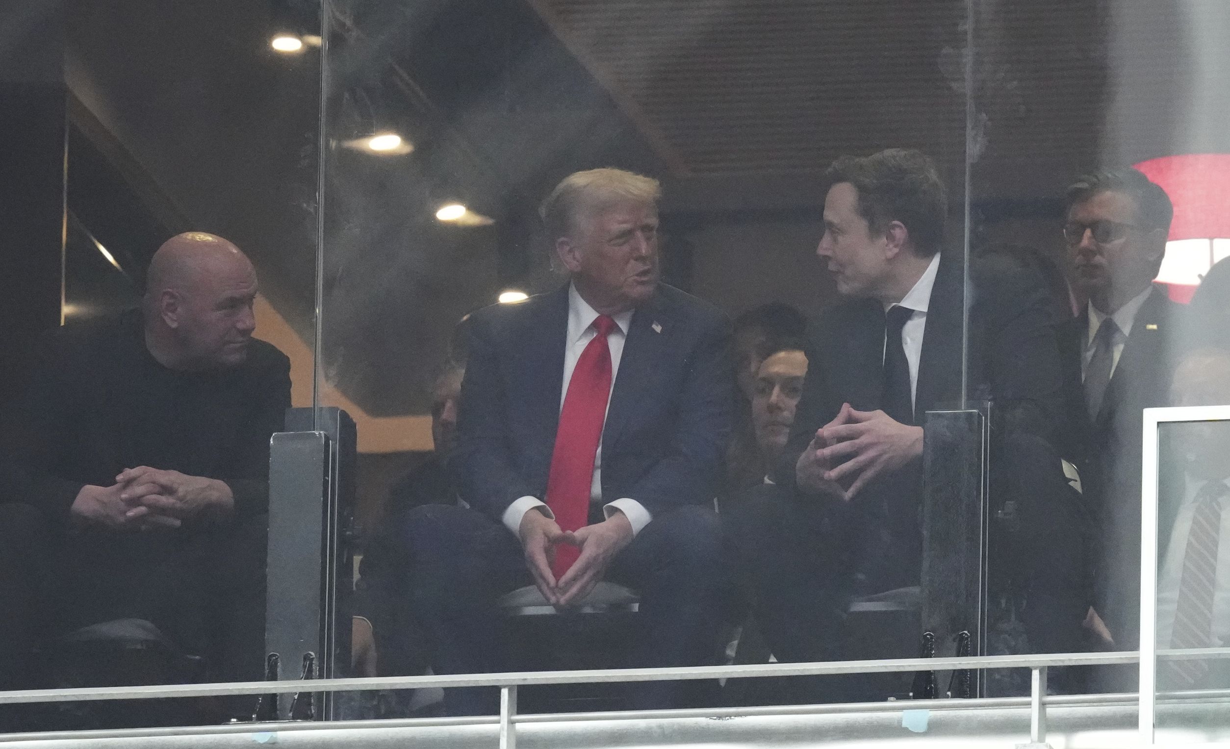 President Trump reunited with Elon Musk during the service. The two are flanked by UFC CEO Dana White (left) and House Speaker Mike Johnson.