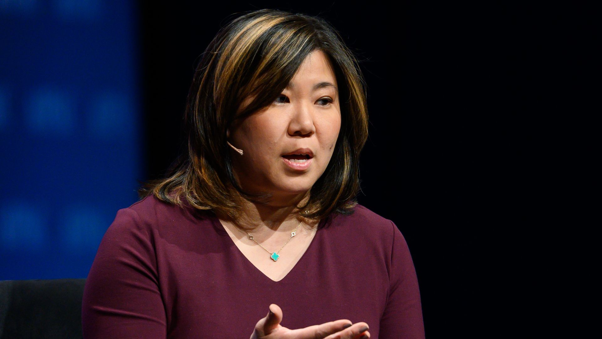 Rep. Grace Meng is seen addressing an audience.