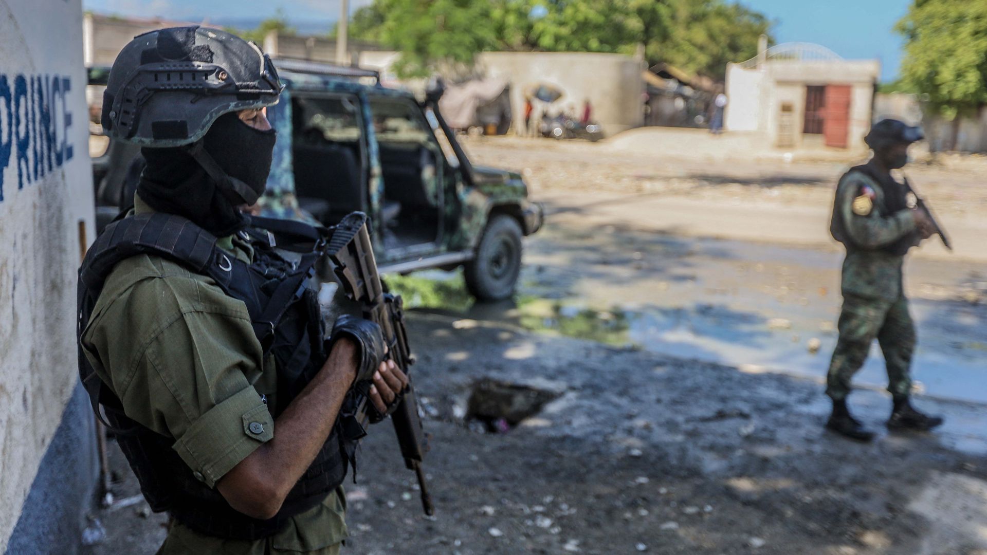 Haitian soldiers guard the public prosecutor's office in Port-au-Prince earlier this month.