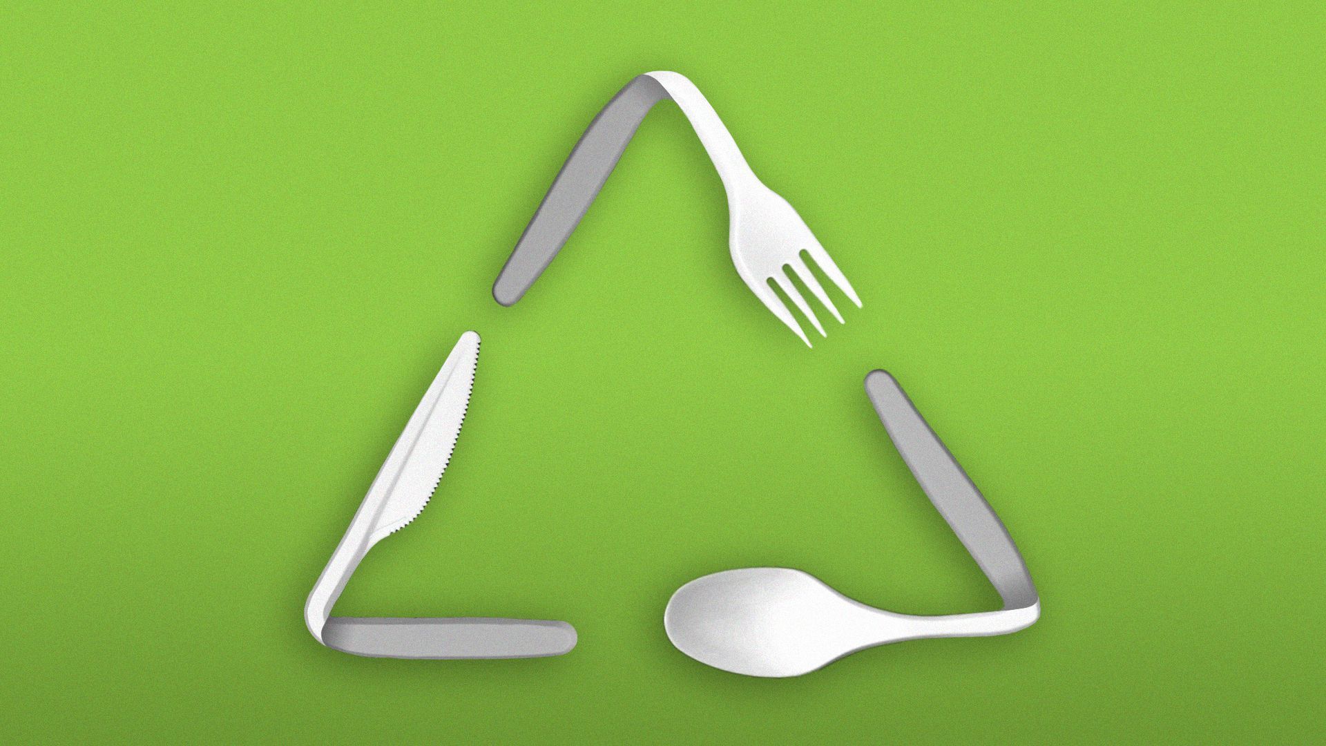 Recycling symbol made of plastic utensils