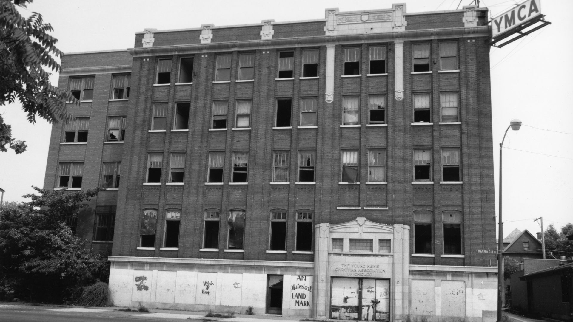 Photo of an old building with a YMCA sign on it 