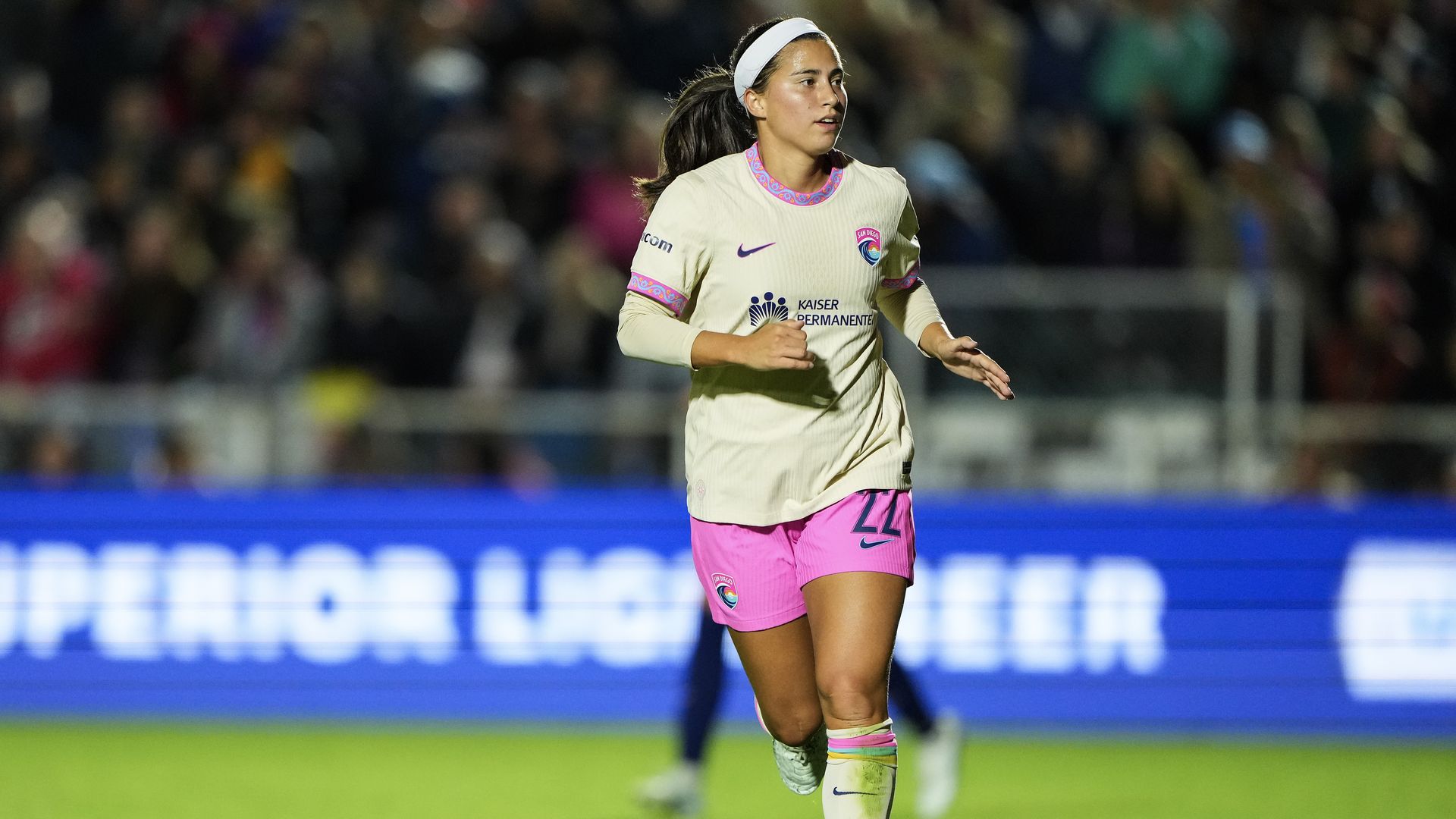 CARY, NORTH CAROLINA - OCTOBER 17: Midfielder Lia Godfrey #22 of the San Diego Wave FC runs upfield during the first half of her match against the North Carolina Courage at First Horizon Stadium on October 17, 2026 in Cary, North Carolina. (Photo by Matt Kelley/NWSL via Getty Images)