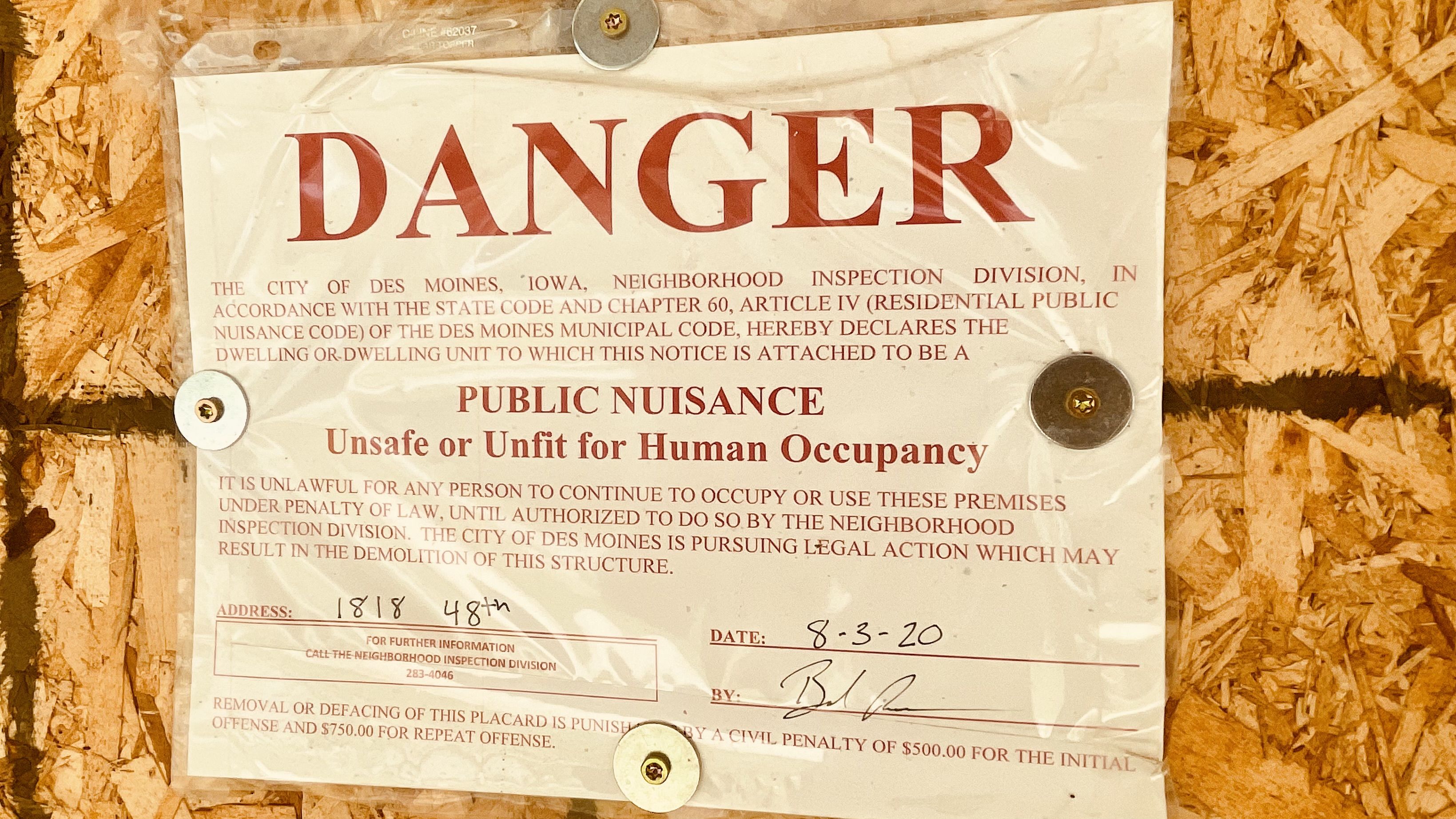 A photo of a public nuisance notice.