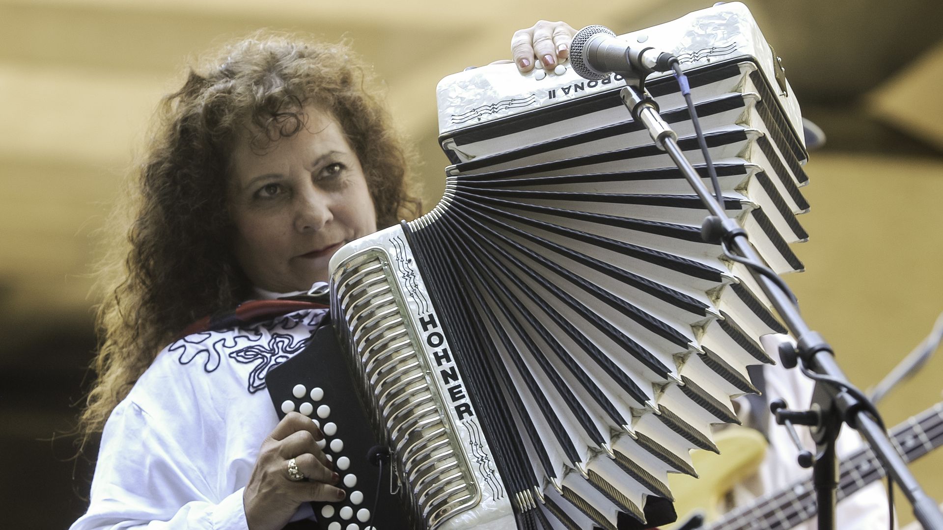 Eva Ybarra plays the accordian