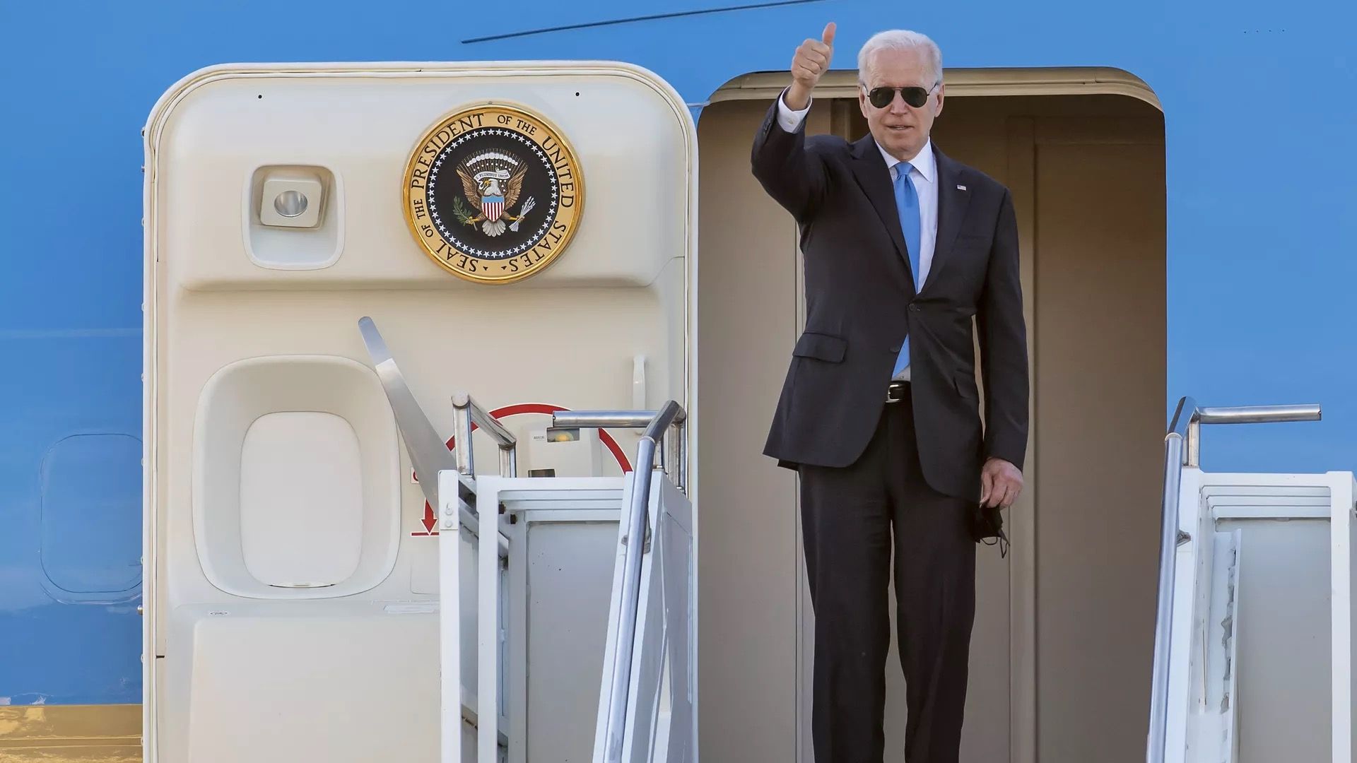 President Biden is seen flashing a thumbs up before leaving Geneva.