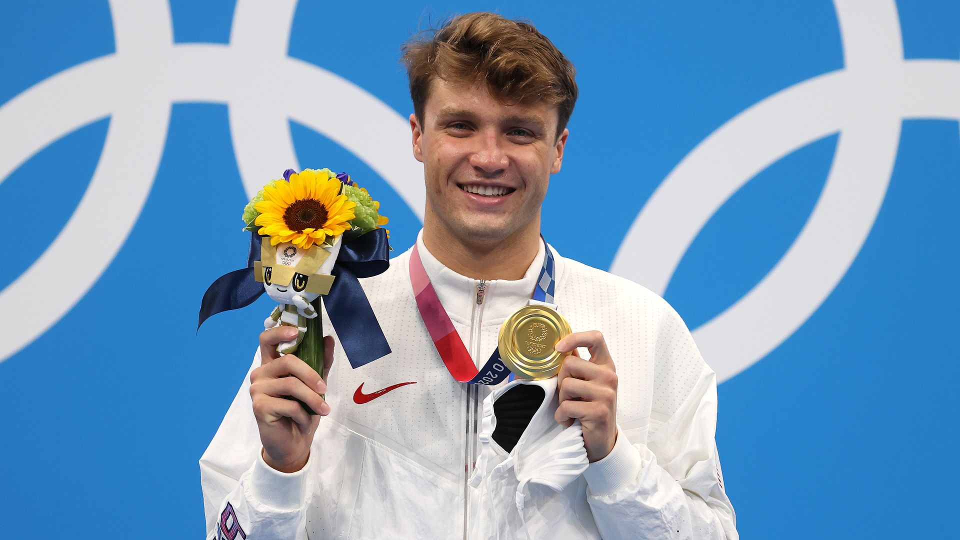 Gold medalist Robert Finke of Team United States poses in the podium of Men's 1500m Freestyle on day nine of the Tokyo 2020 Olympic Games