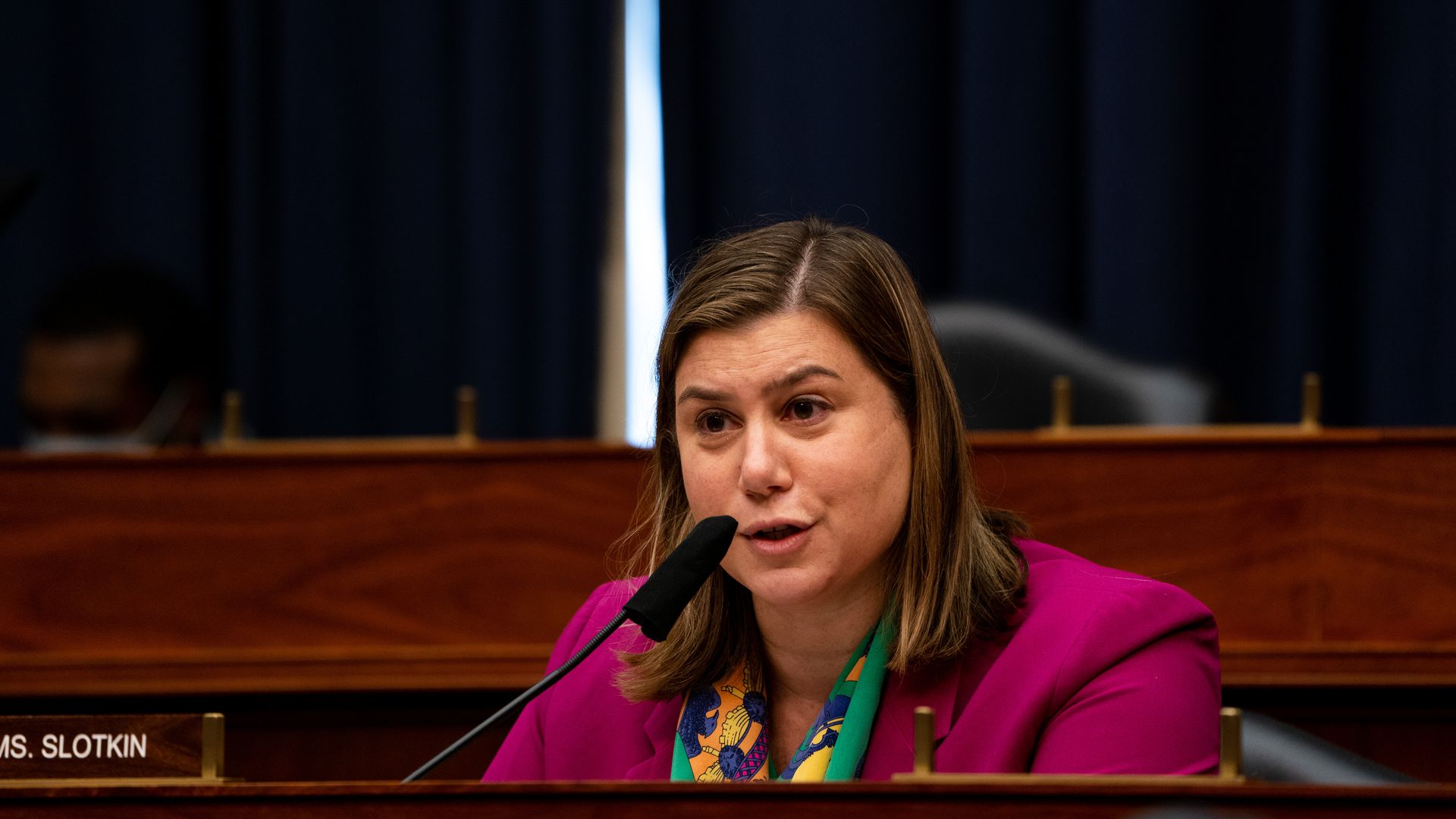 Photo of Elissa Slotkin speaking into a mic