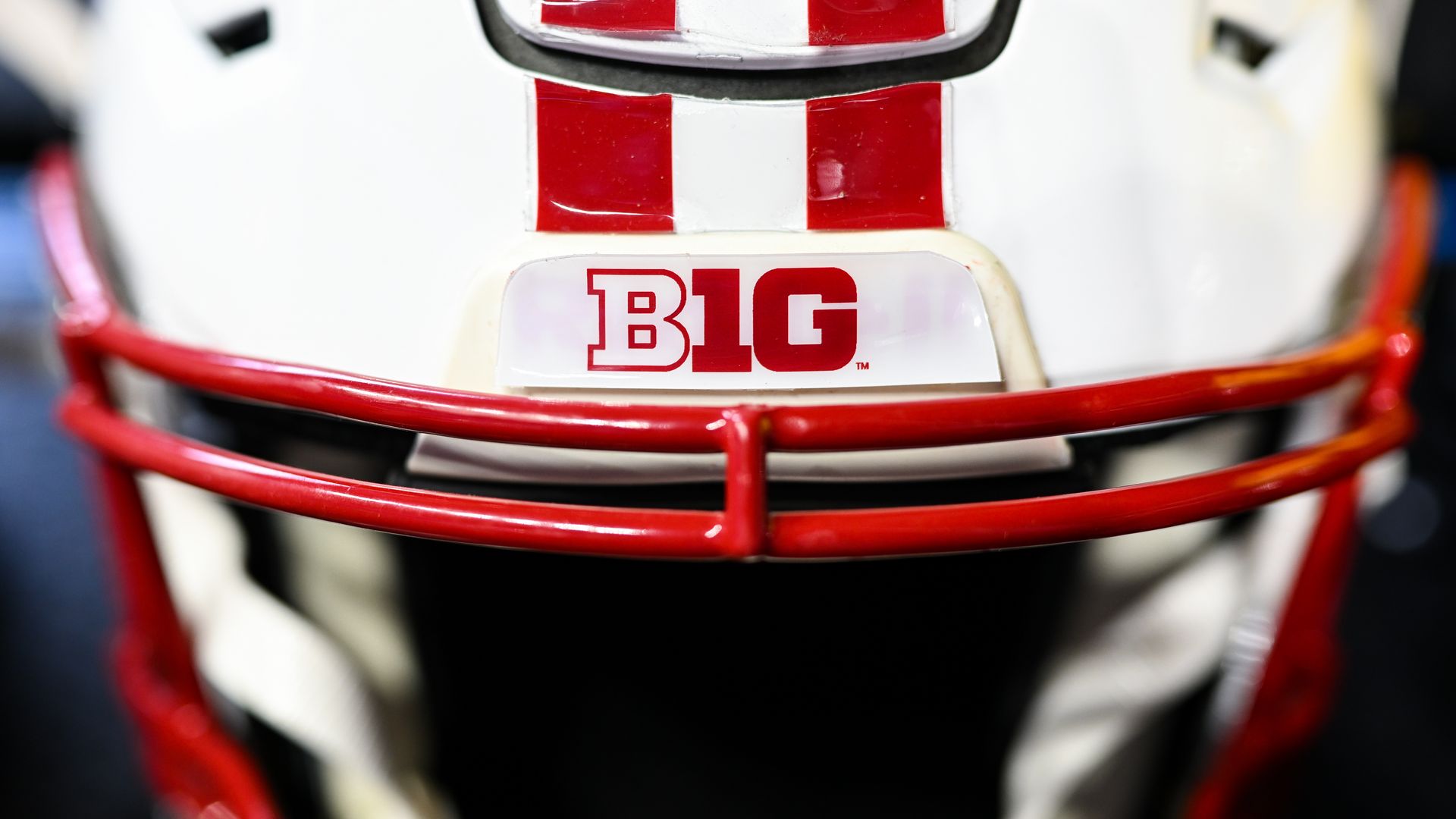 Combining NFL helmets with the colors of local college teams