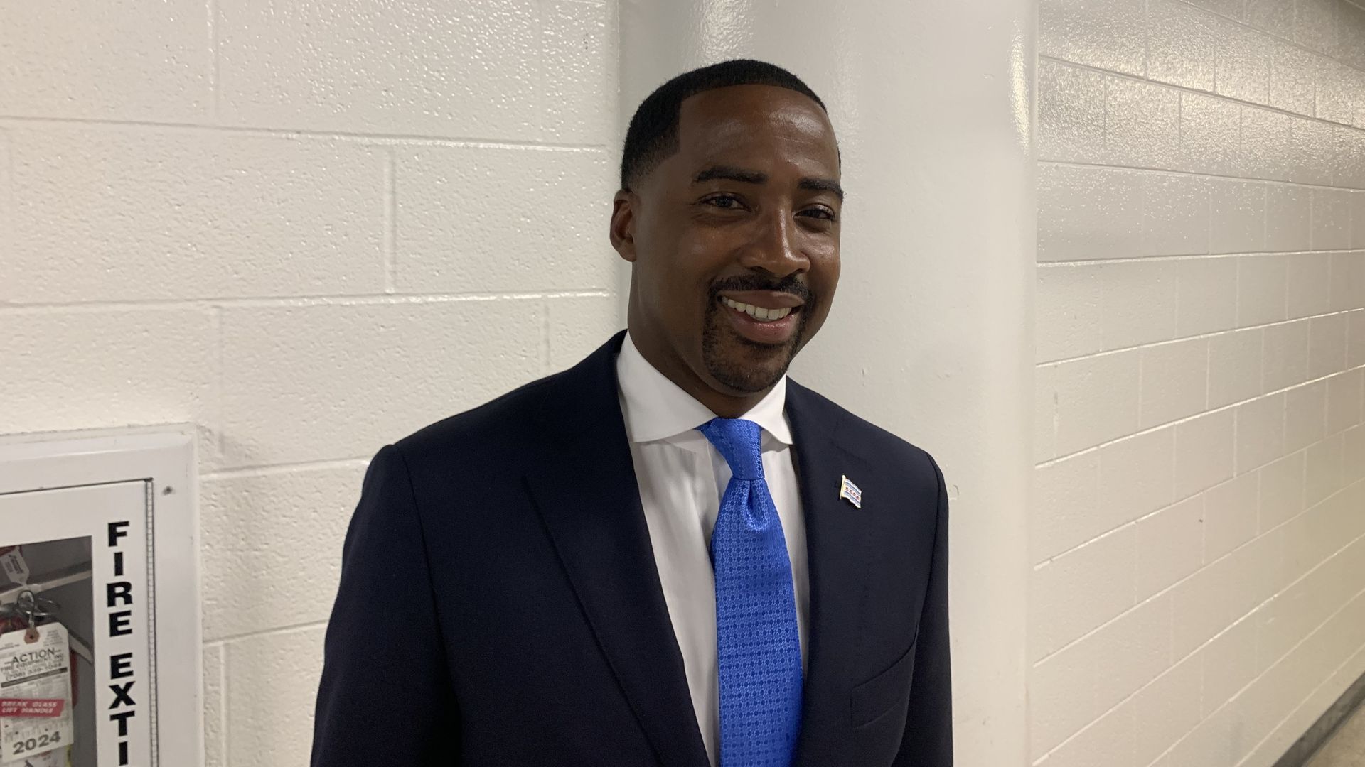 Photo of a man standing posing for camera 