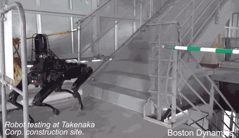 Robot running up stairs at a construction site