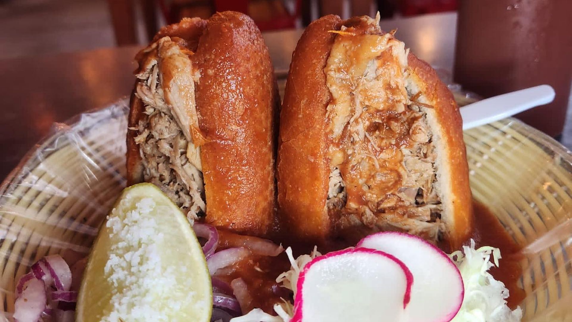 The famous torta ahogada is served with radish and lime.