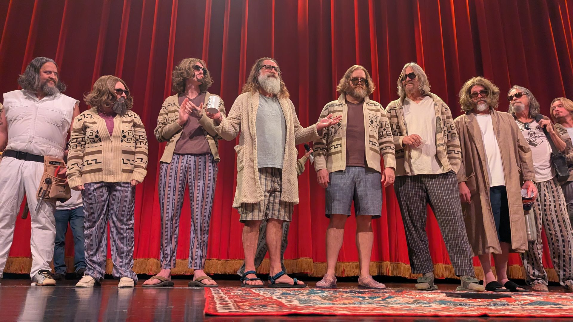 Nine men costumed as The Dude from "The Big Lebowski."