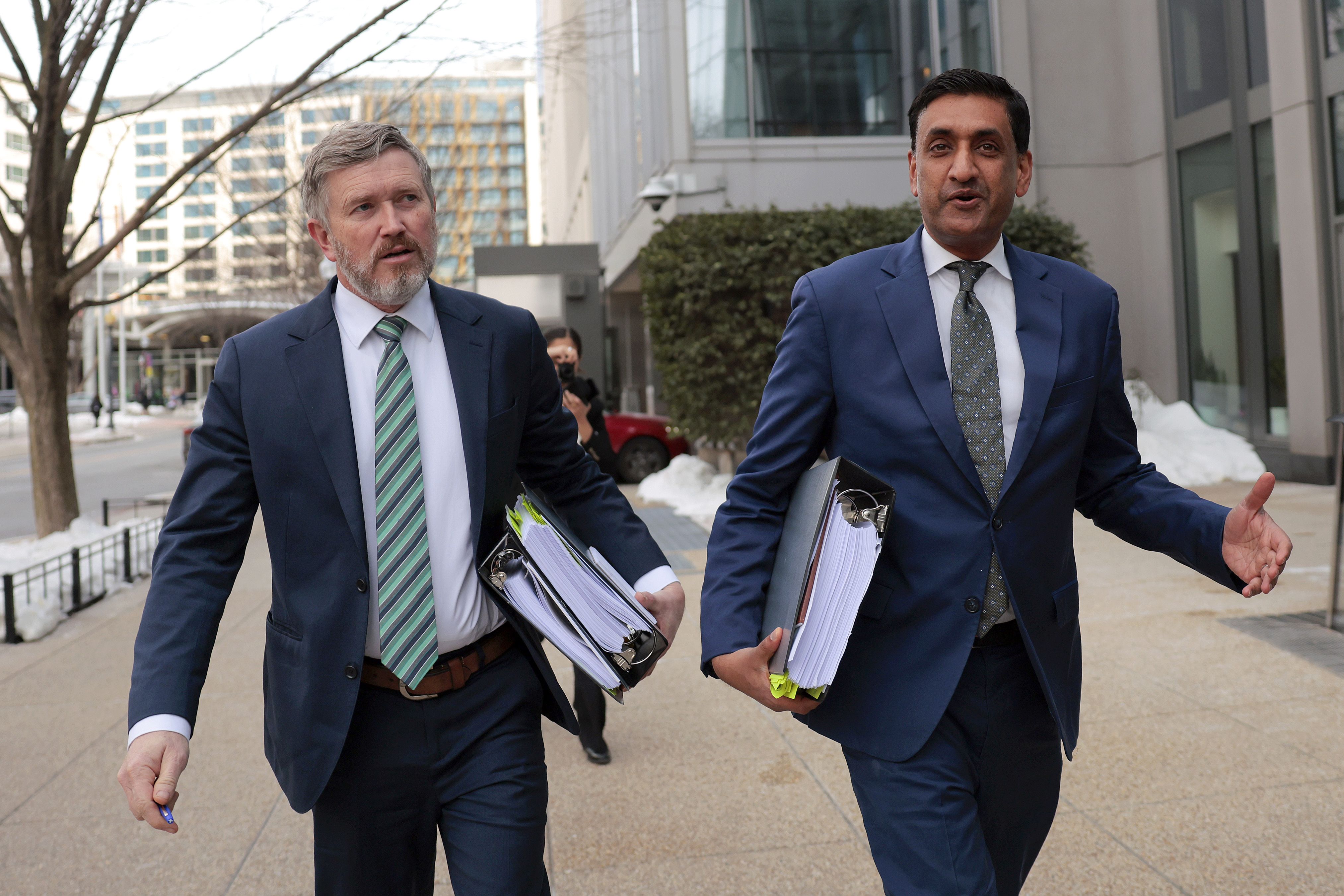 Reps. Thomas Massie (R-Ky.) and Ro Khanna (D-Calif.) arrive at the Justice Department to review an unredacted version of the Epstein files.
