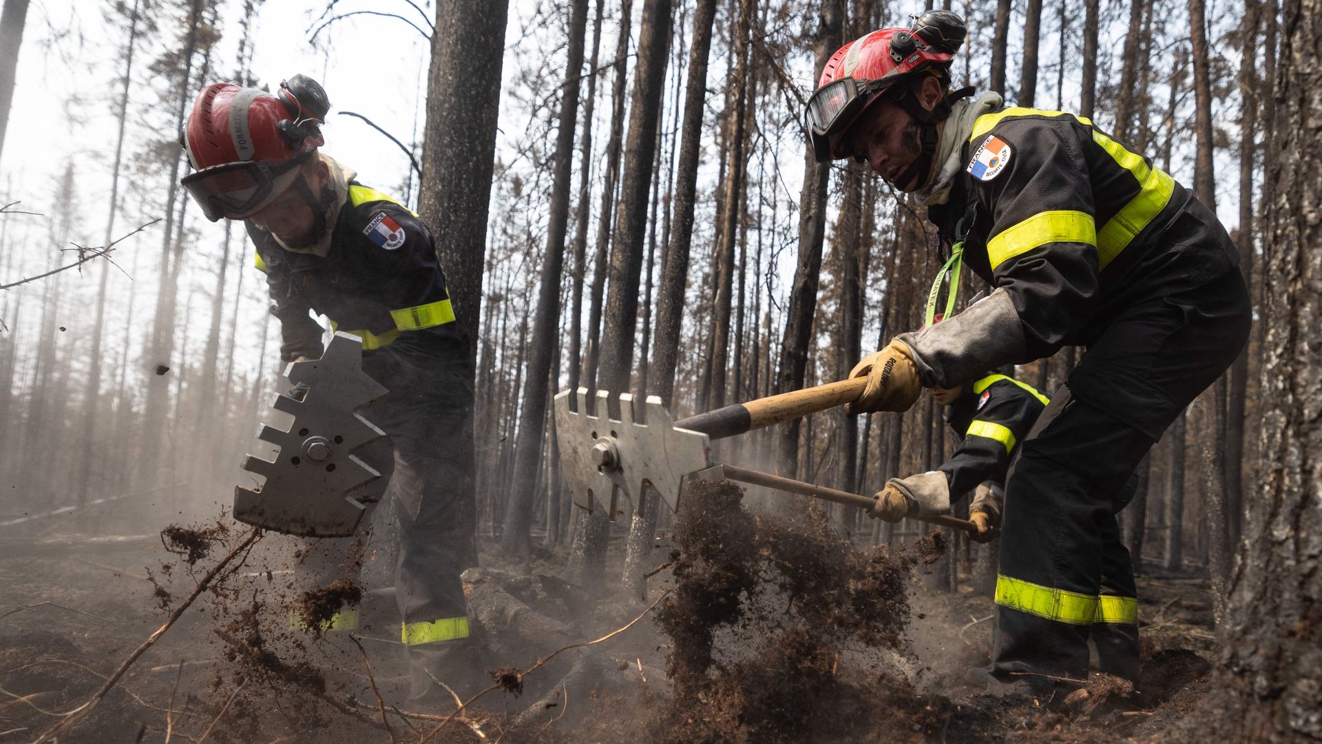 Firefighters battling a fire near the town of Chibougamau, Quebec, in Canada on June 12.