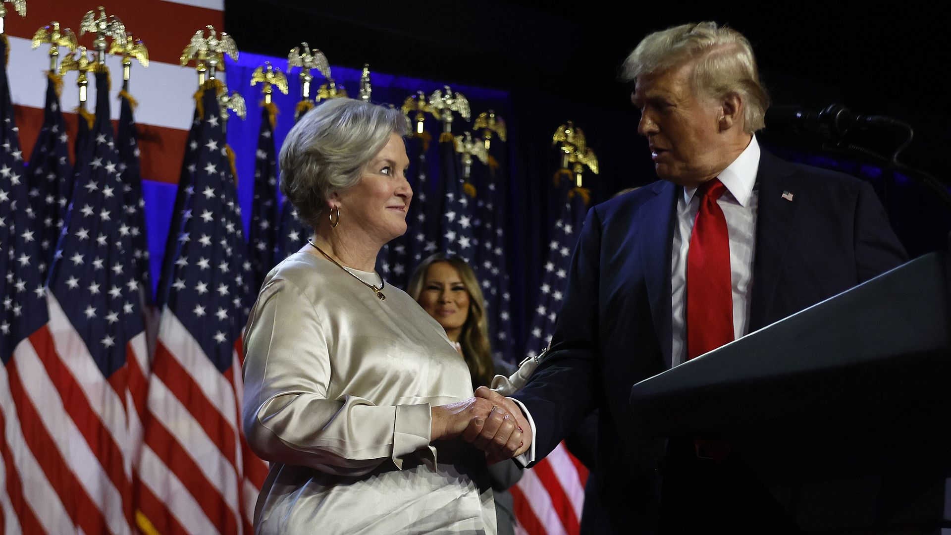Republican presidential nominee, former U.S. President Donald Trump praises his campaign senior advisor Susie Wiles during an election night event at the Palm Beach Convention Center on November 06, 2024 in West Palm Beach, Florida.