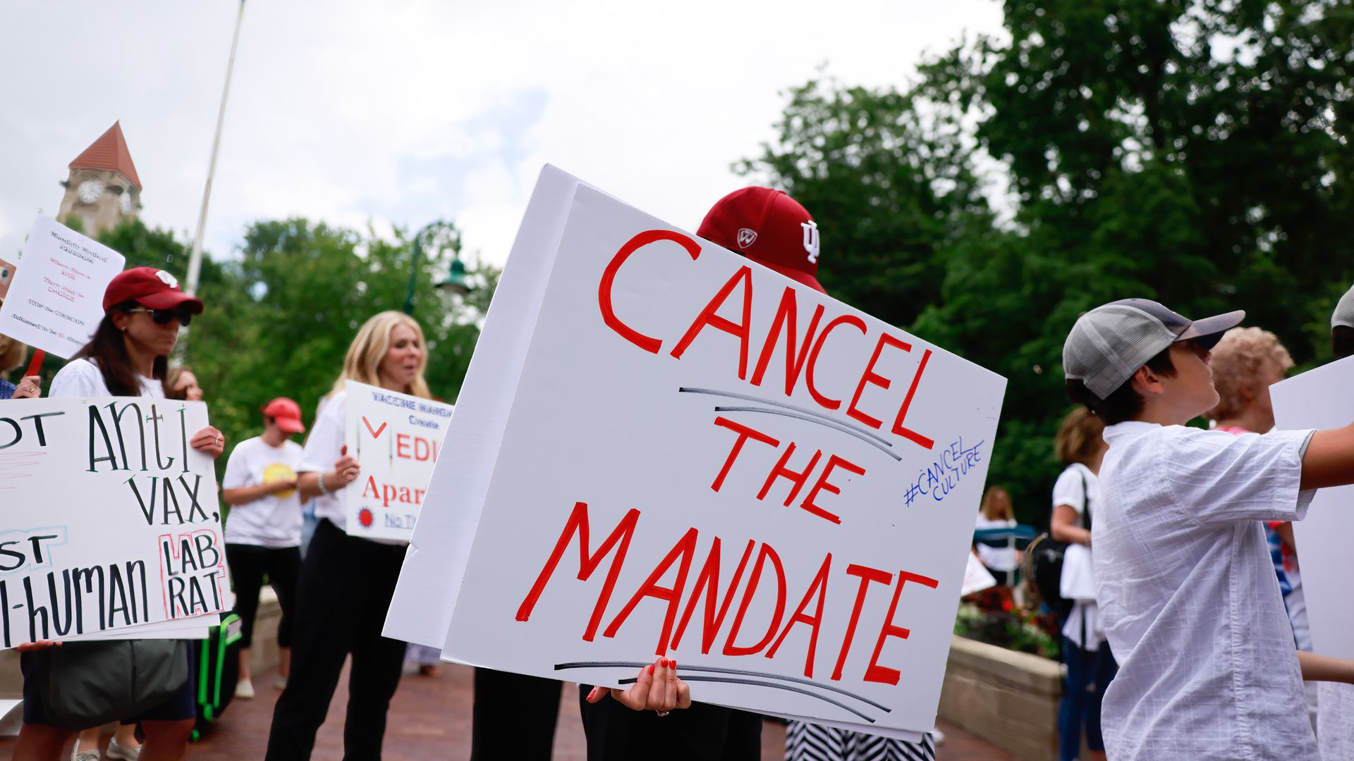 People protesting  Indiana University's coronavirus vaccination mandate in Bloomington in June 2021.