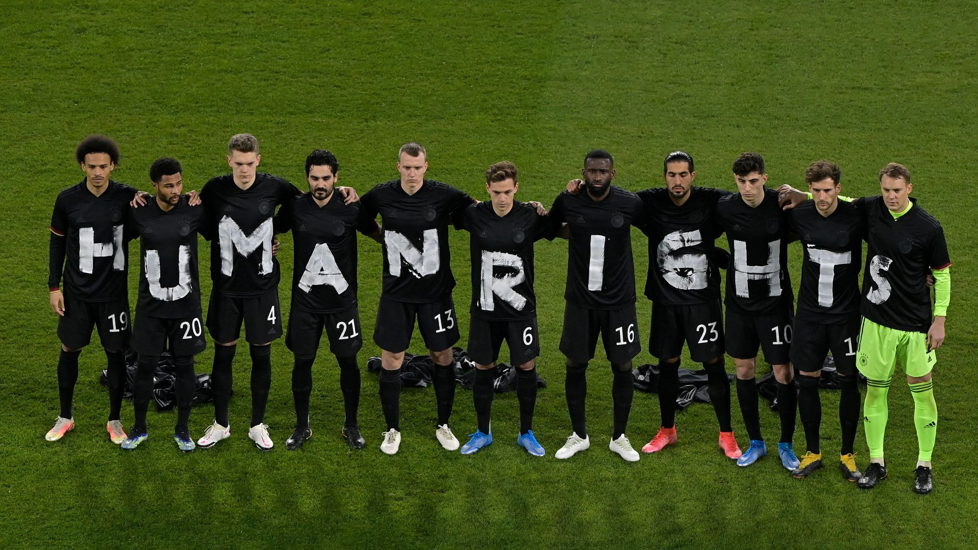 Germany's players pose for a group photo with the wording "Human rights" on their T-shirts prior to the FIFA World Cup Qatar 2022 qualification football match  v Iceland in Duisburg in 2021. 