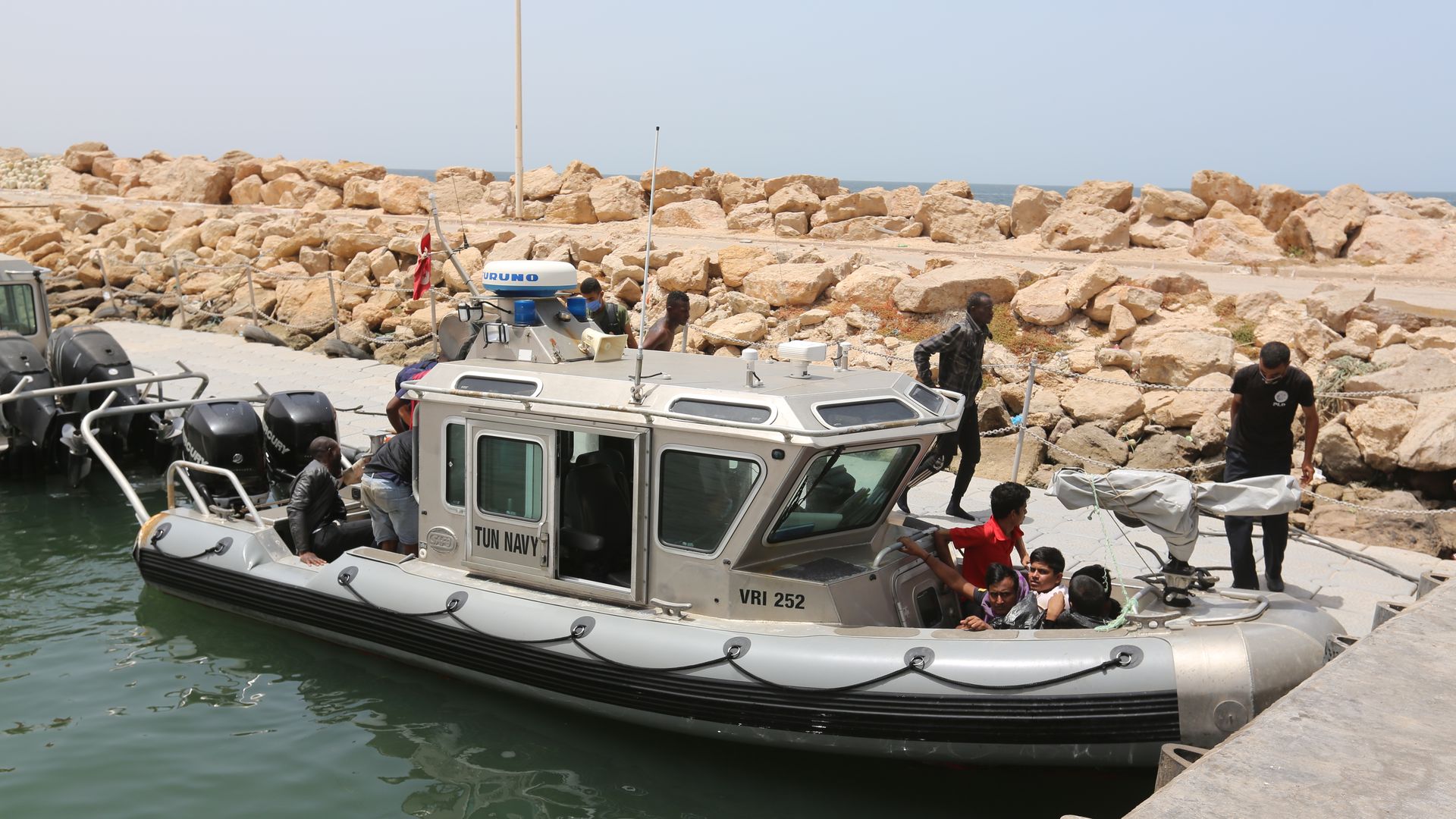 Tunisian naval forces rescue 178 migrants from the Mediterranean after the boats transporting them broke down while trying to reach Europe, in Tunisia on June 27, 2021. 