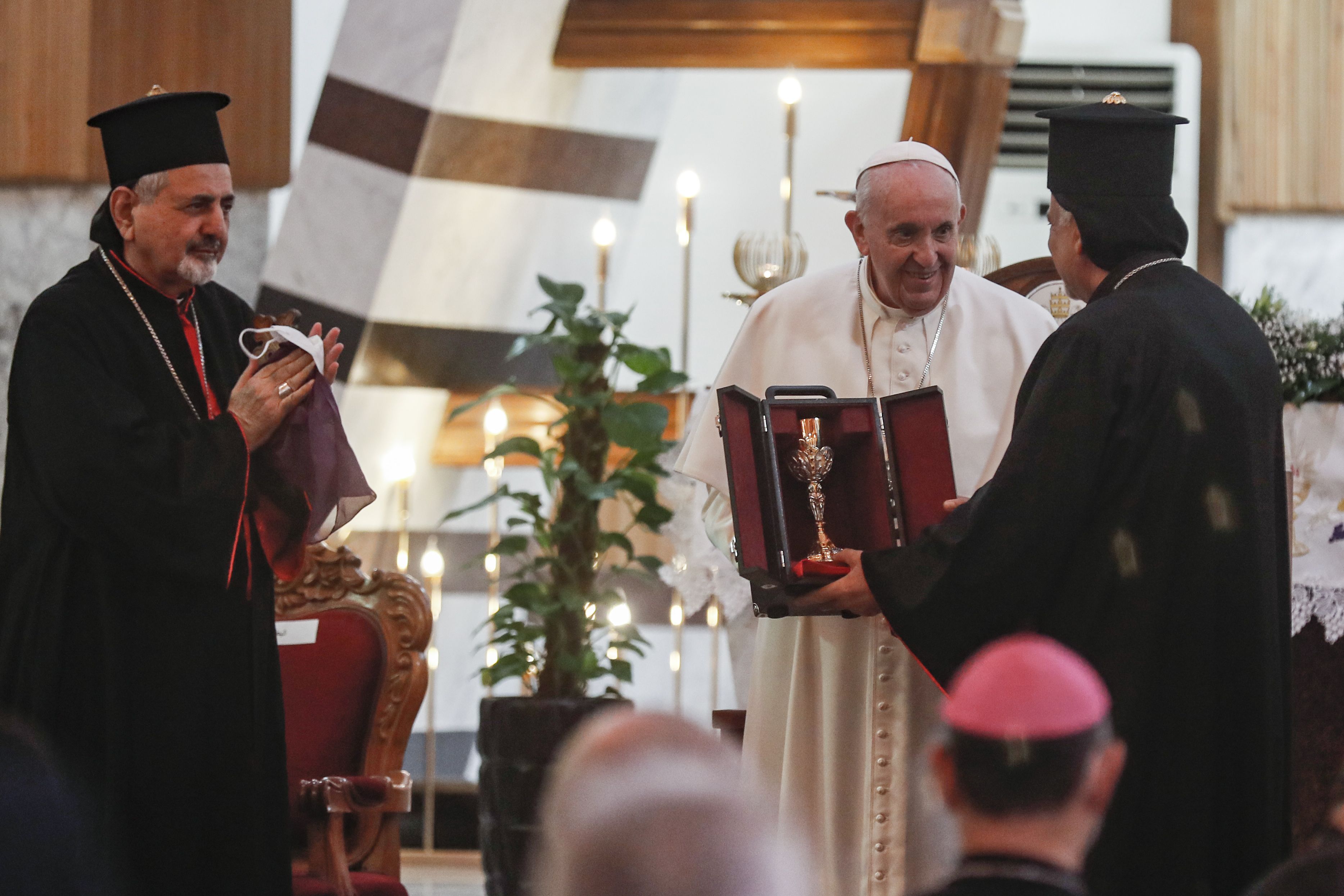 Picture of the Pope receiving an ornamental candlestick gift 