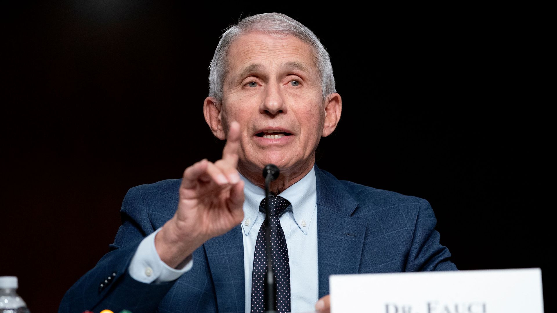 Dr. Anthony Fauci gives opening statements during a Senate hearing.