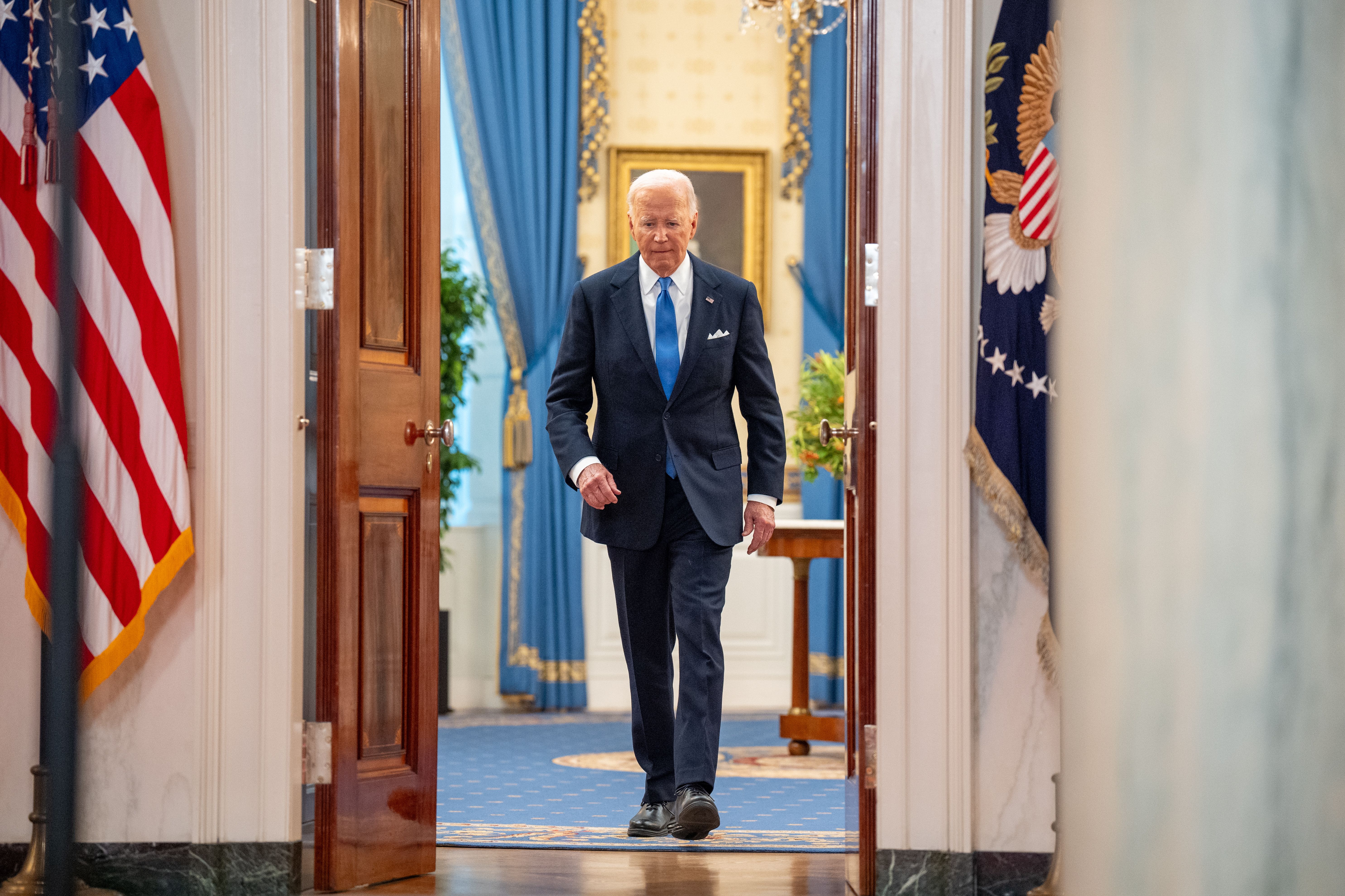 President Joe Biden arrives for a news conference following the Supreme Court's ruling on charges against former President Donald Trump that he sought to subvert the 2020 election, at the White House on July 1