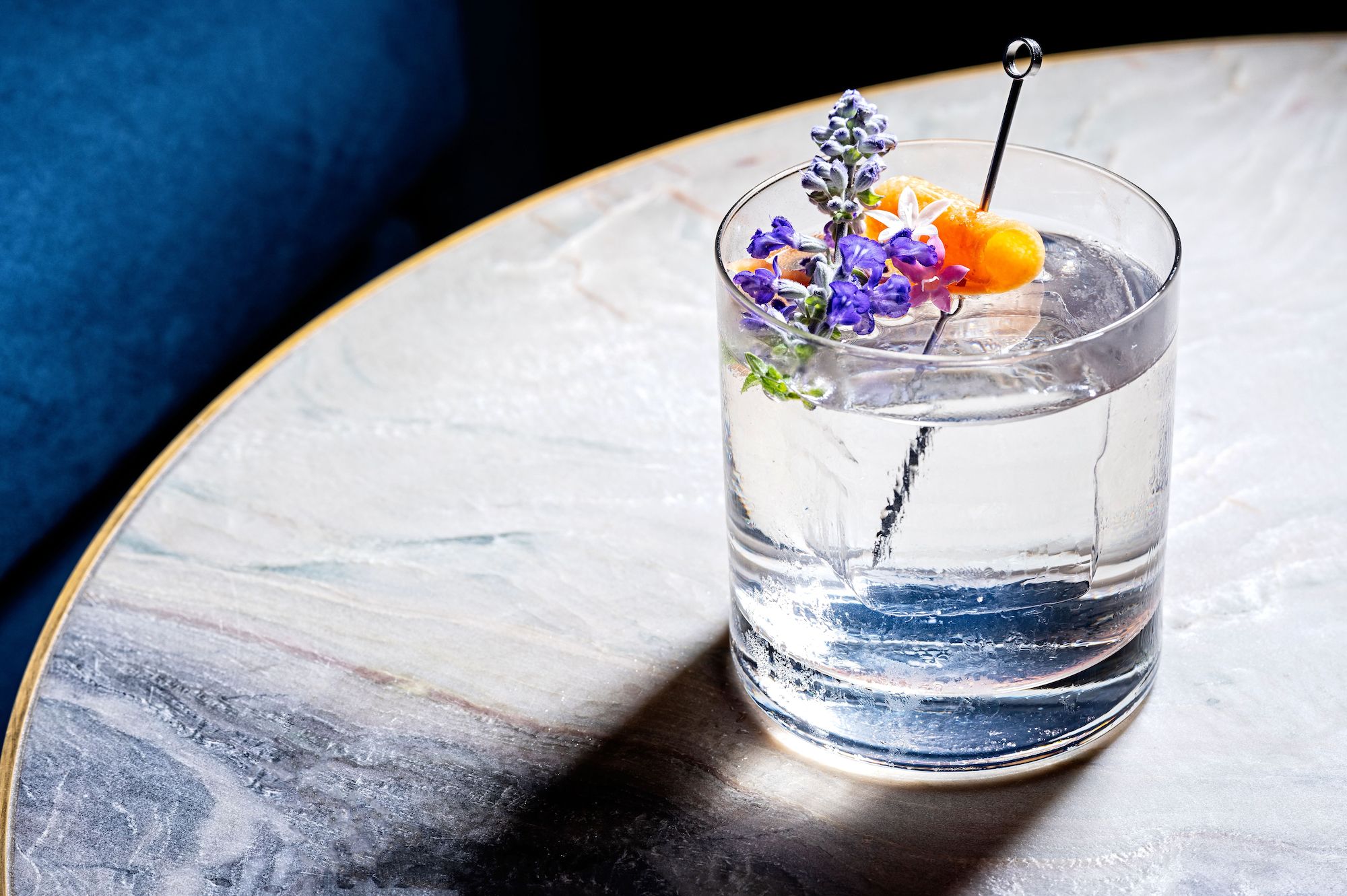 Cocktail with floral garnish