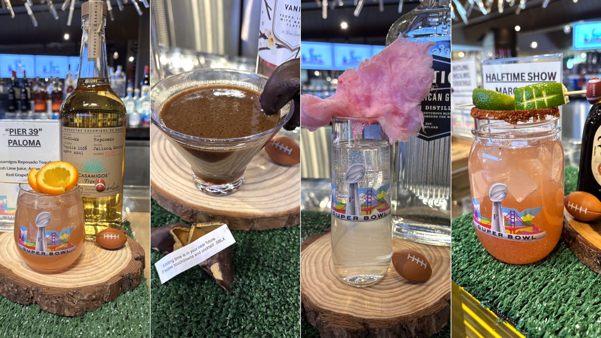 Four Super Bowl-themed cocktails on wooden slabs with mini footballs; drinks include a tequila Paloma, a chocolate-covered martini, a clear drink with pink cotton candy, and a jar with a lime garnish.