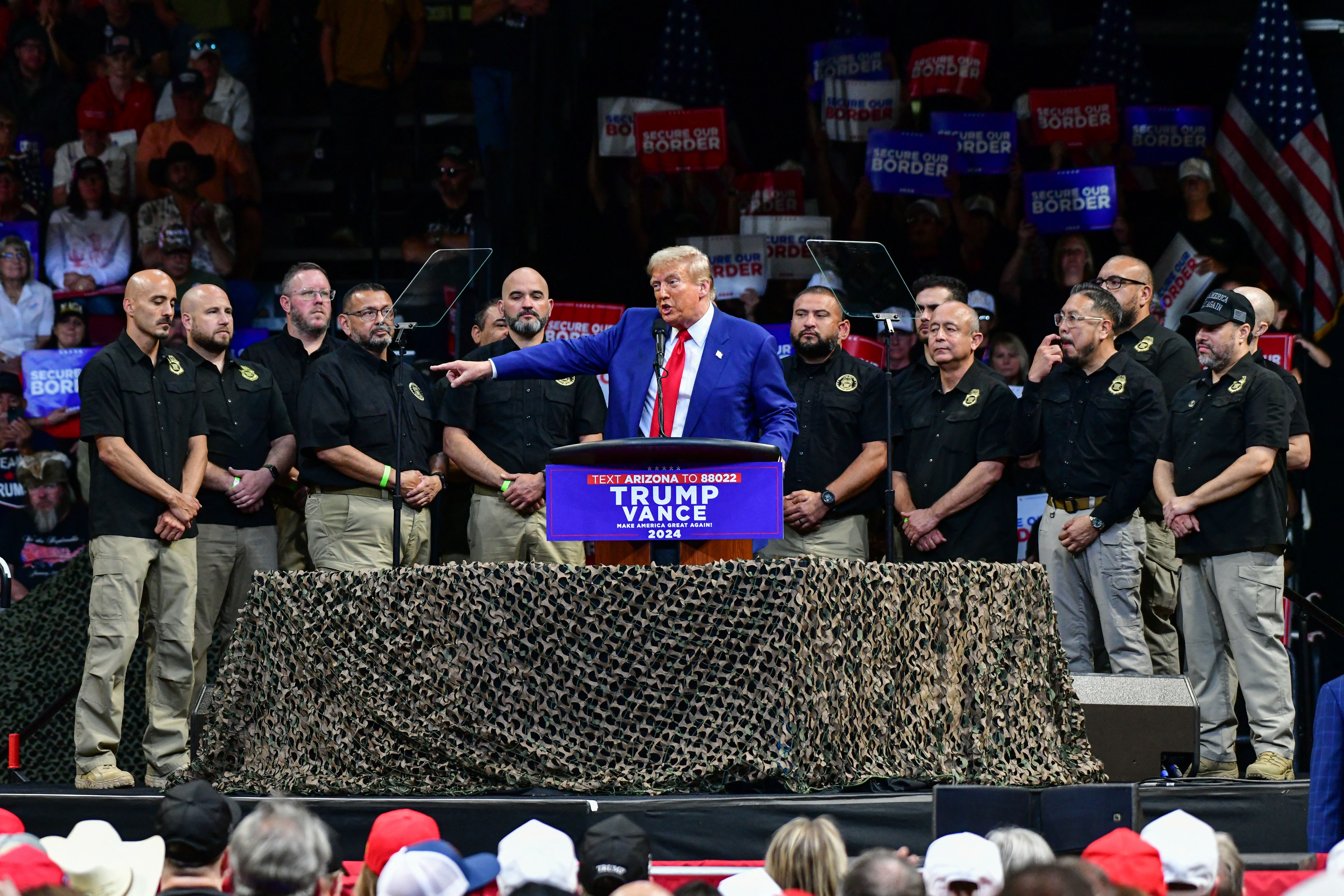 - Former US President and Republican presidential candidate Donald Trump speaks alongside National Border Patrol Union members after they endorsed Trump, during a campaign rally at Findlay Toyota Arena in Prescott Valley, Arizona