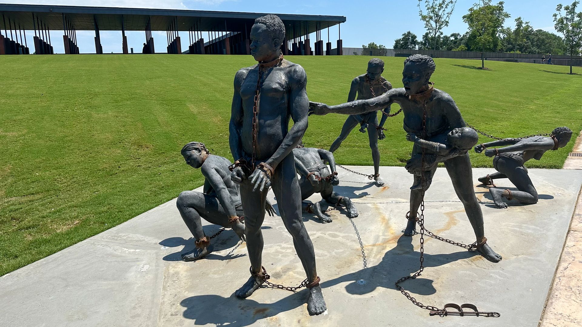 A sculpture of enslaved Black people sits at the site of the National Memorial for Peace and Justice on Montogomery, Alabama on Aug. 5, 2023.