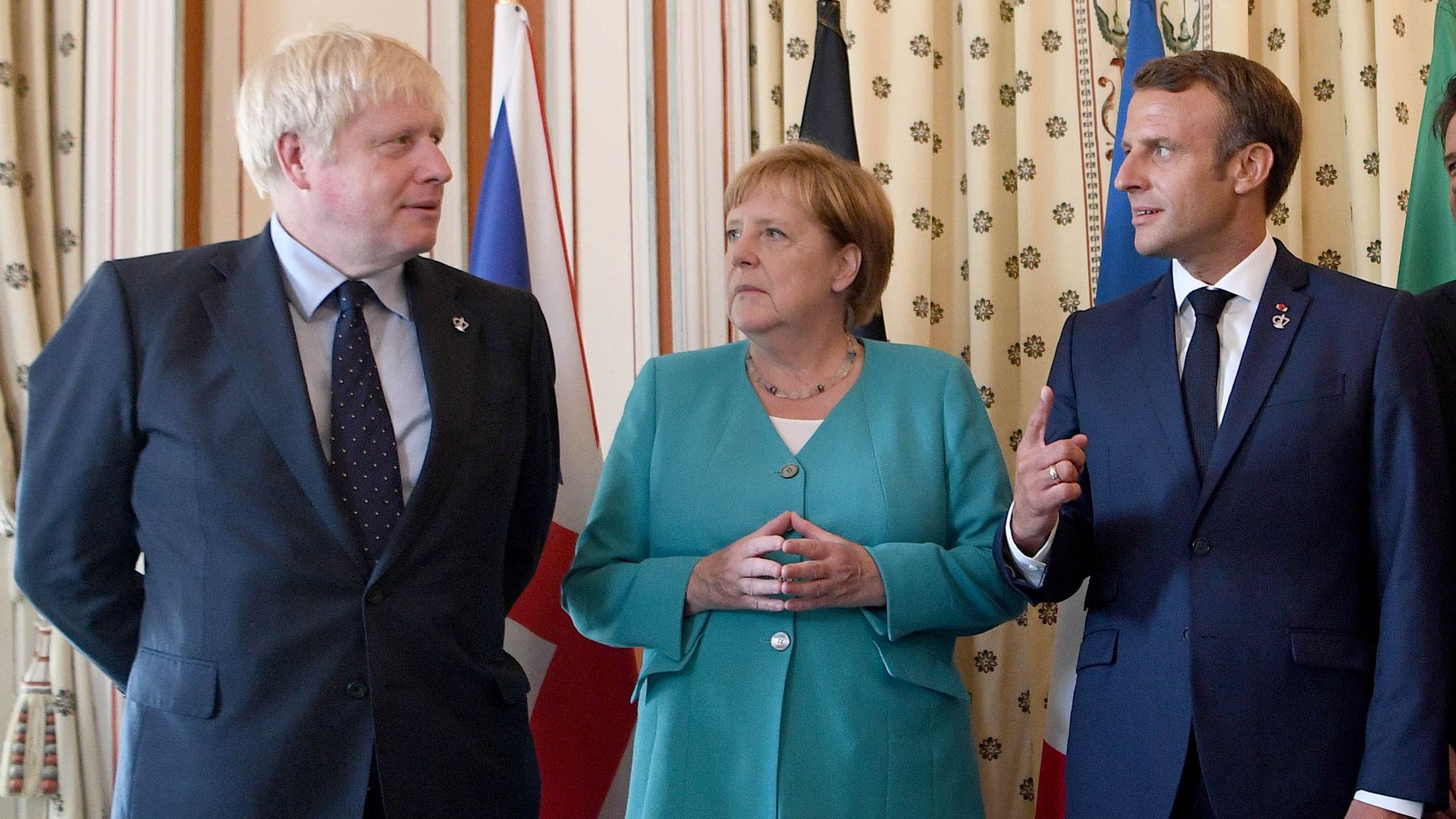 British Prime Minister Boris Johnson, German Chancellor Angela Merkel and French President Emmanuel Macron at the G7 in France