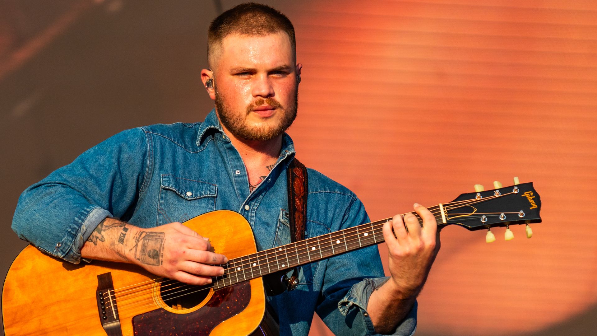Zach Bryan sings onstage during his BST Hyde Park performance in London.